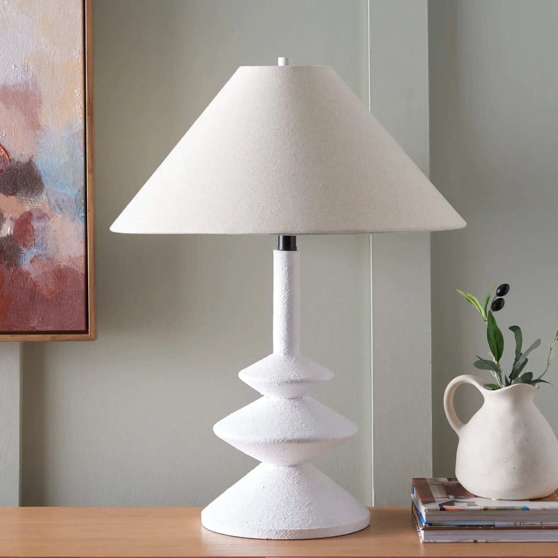 Jessy Table Lamp in White in a styled room