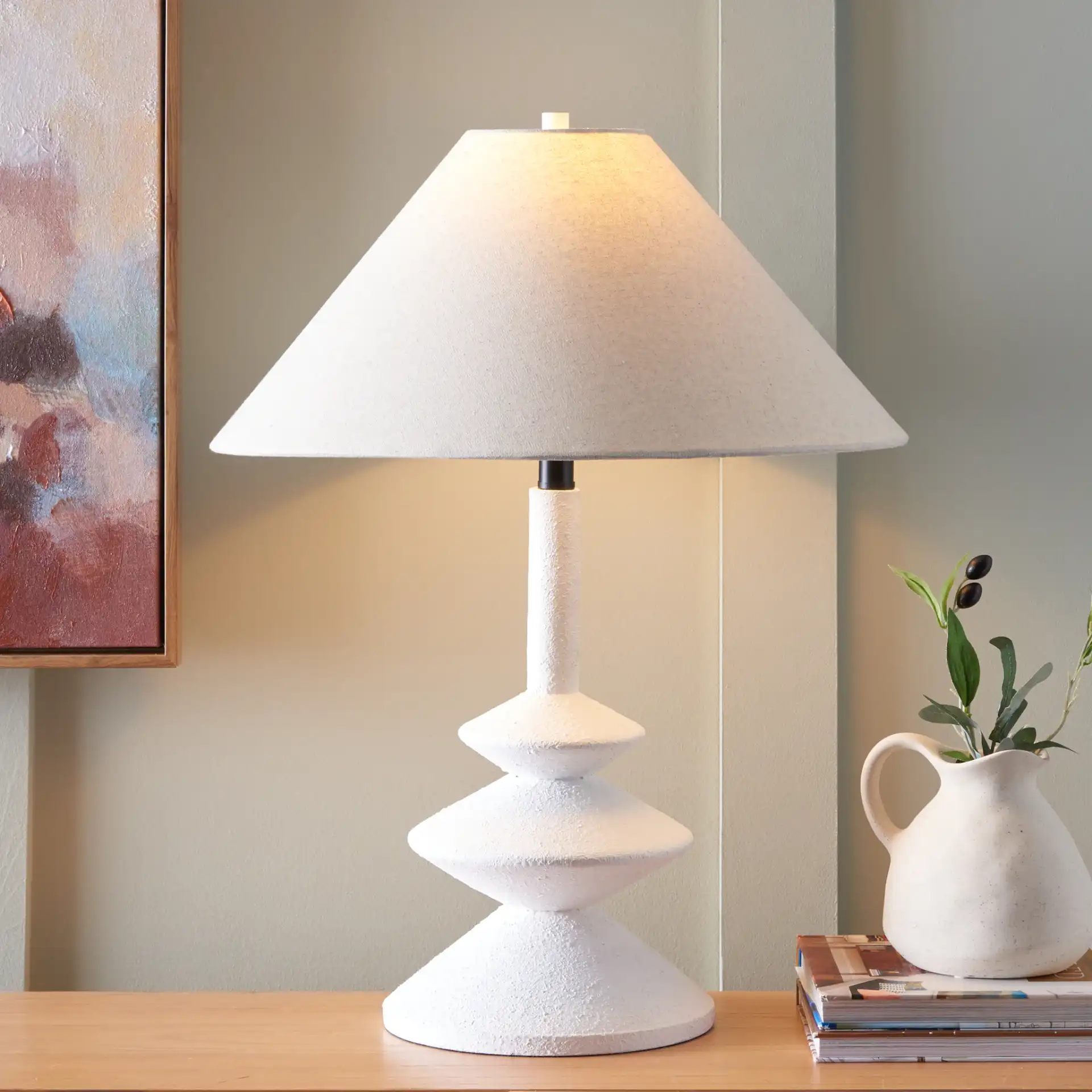 Jessy Table Lamp in White in a styled room