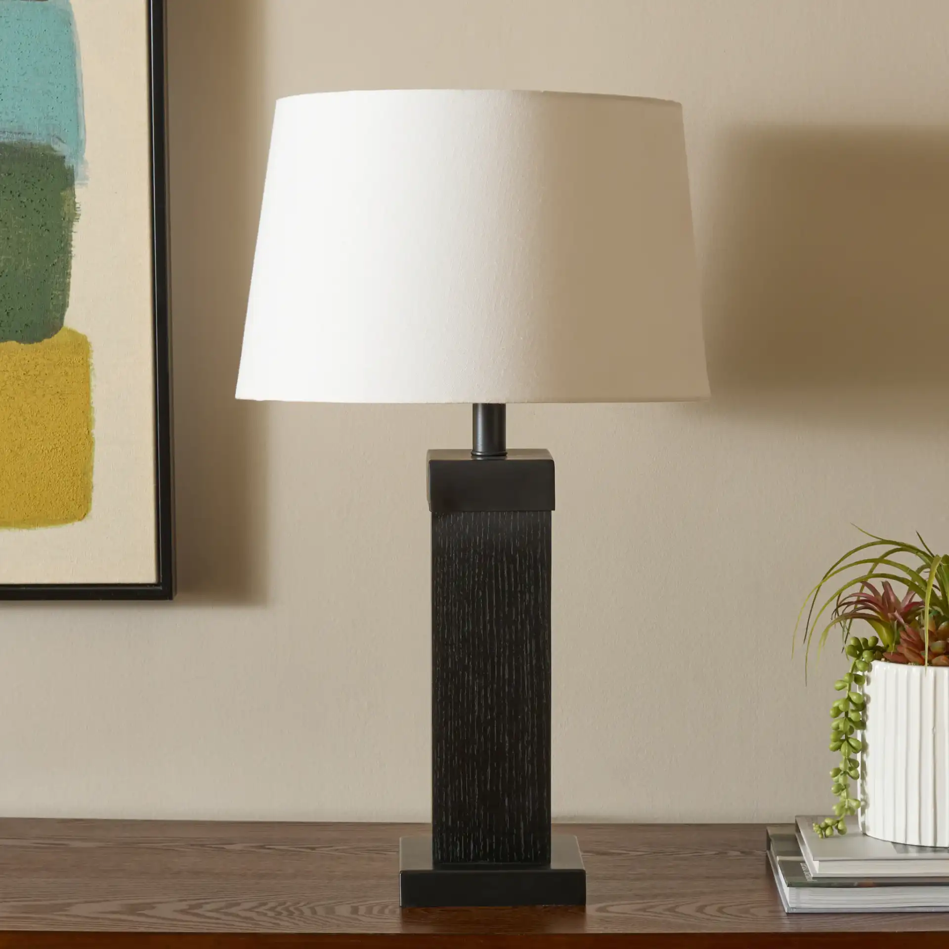 Reine Table Lamp in Black in a styled room