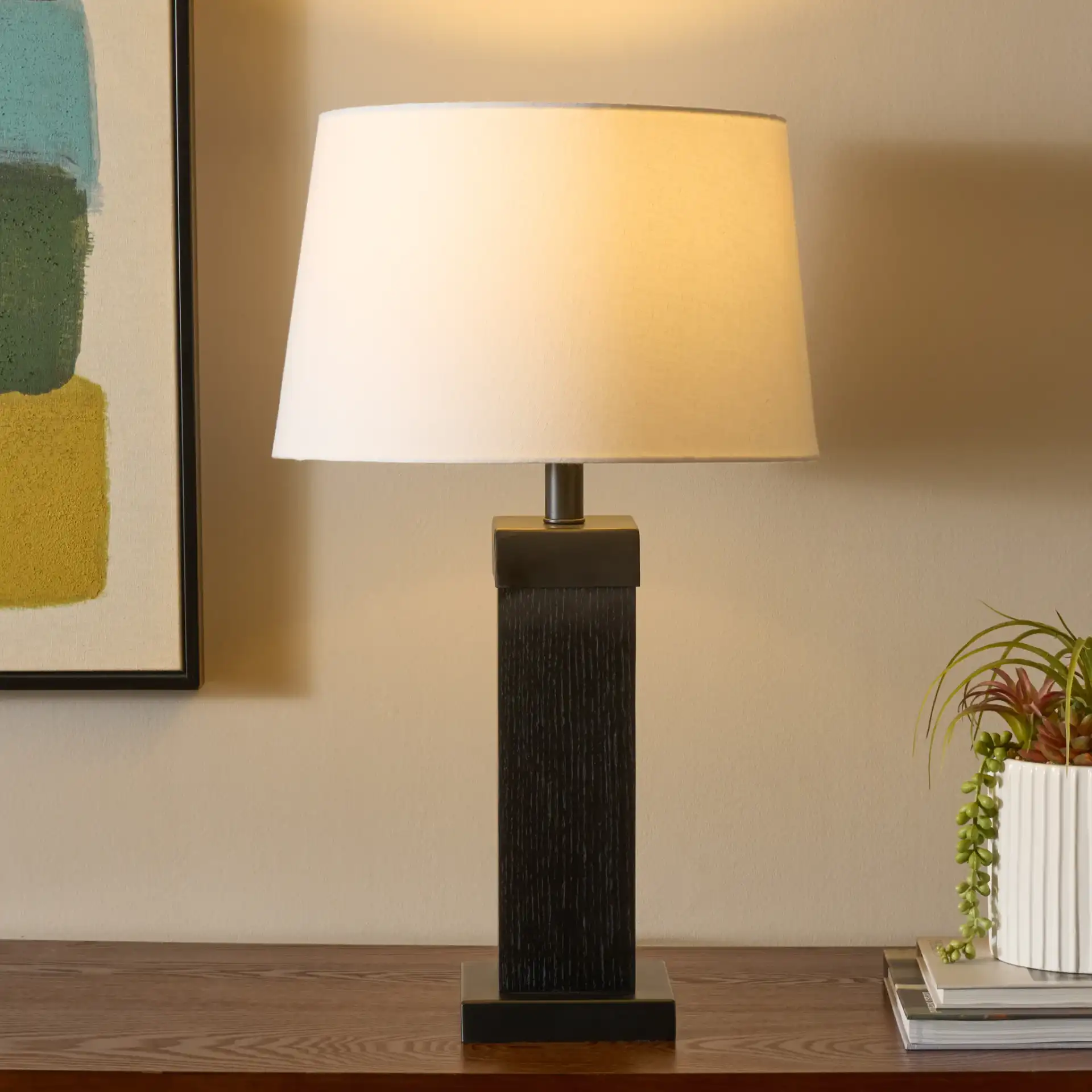 Reine Table Lamp in Black in a styled room