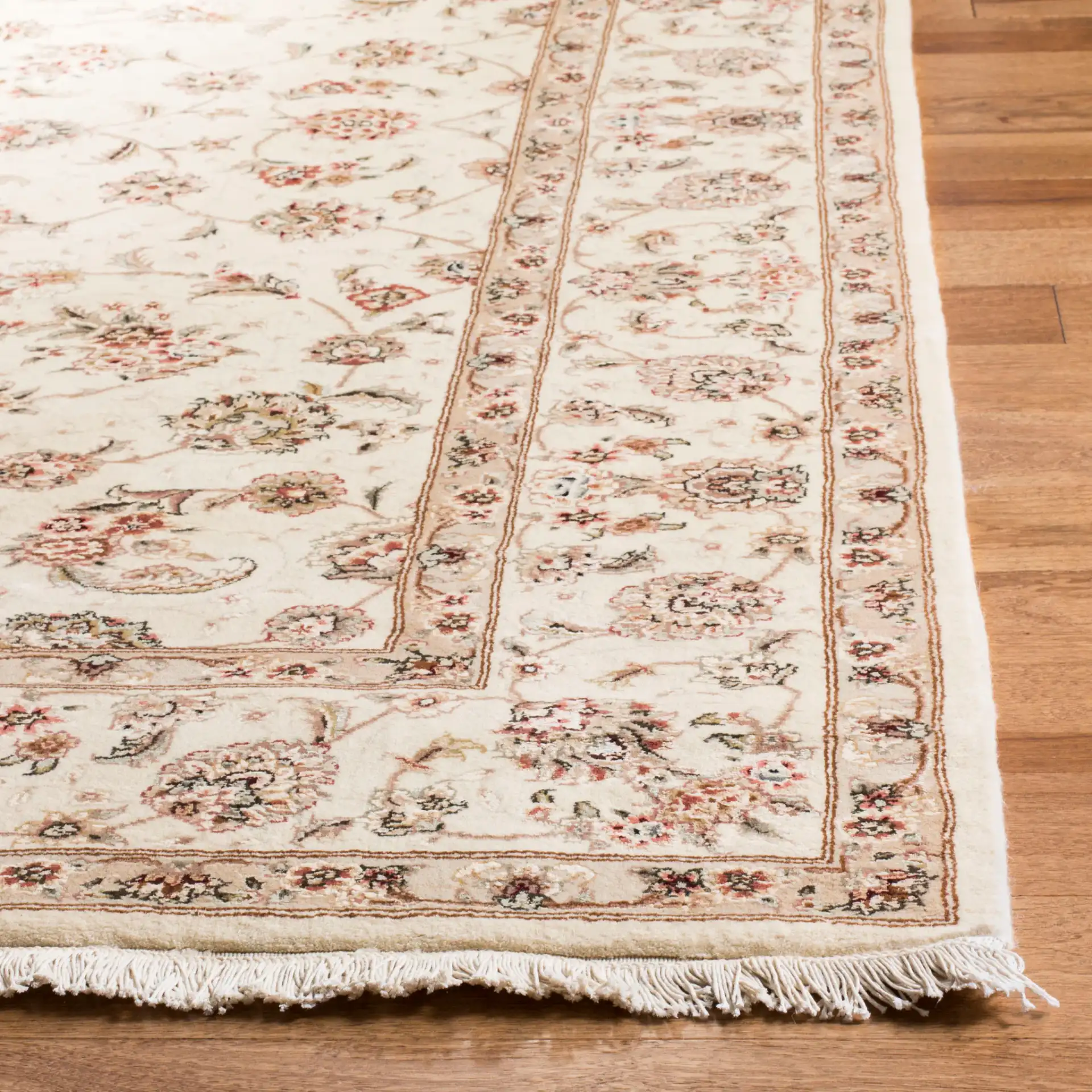 Tabriz Floral Arabesque Bordered Rug in Ivory in a styled room