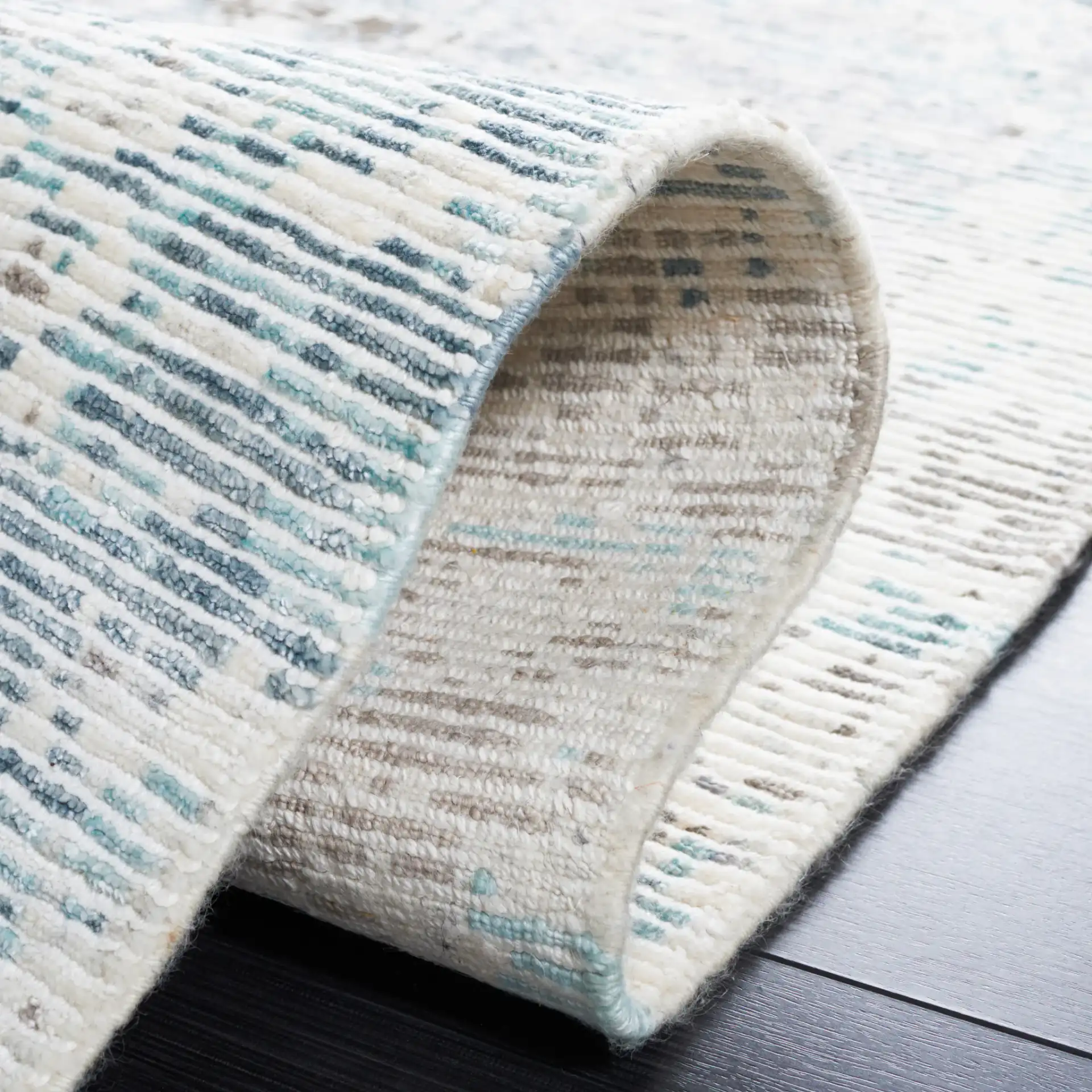 Tiffany Striated Abstract Hand-Knotted Rug in Silver / Blue in a styled room