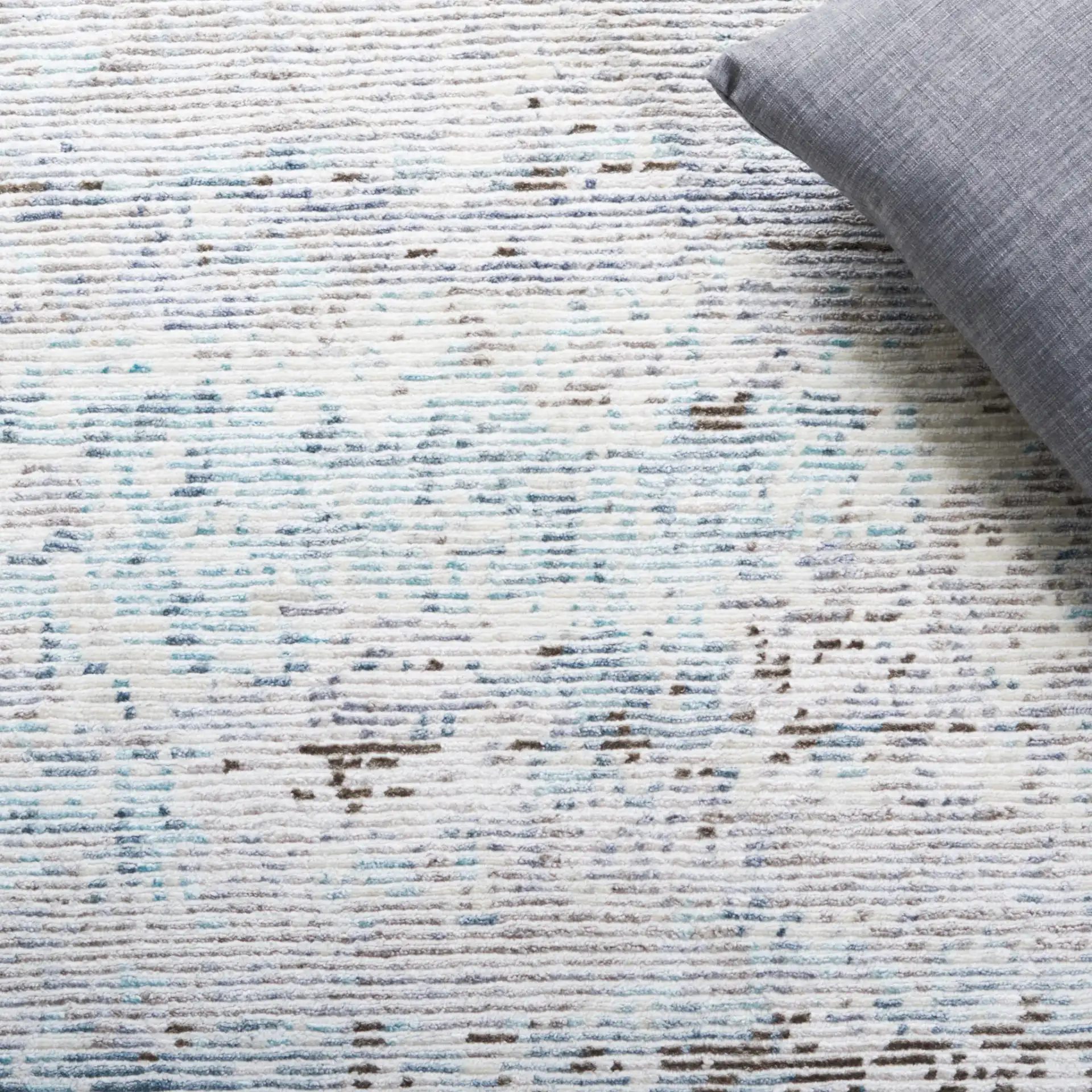 Tiffany Striated Abstract Hand-Knotted Rug in Silver / Blue in a styled room