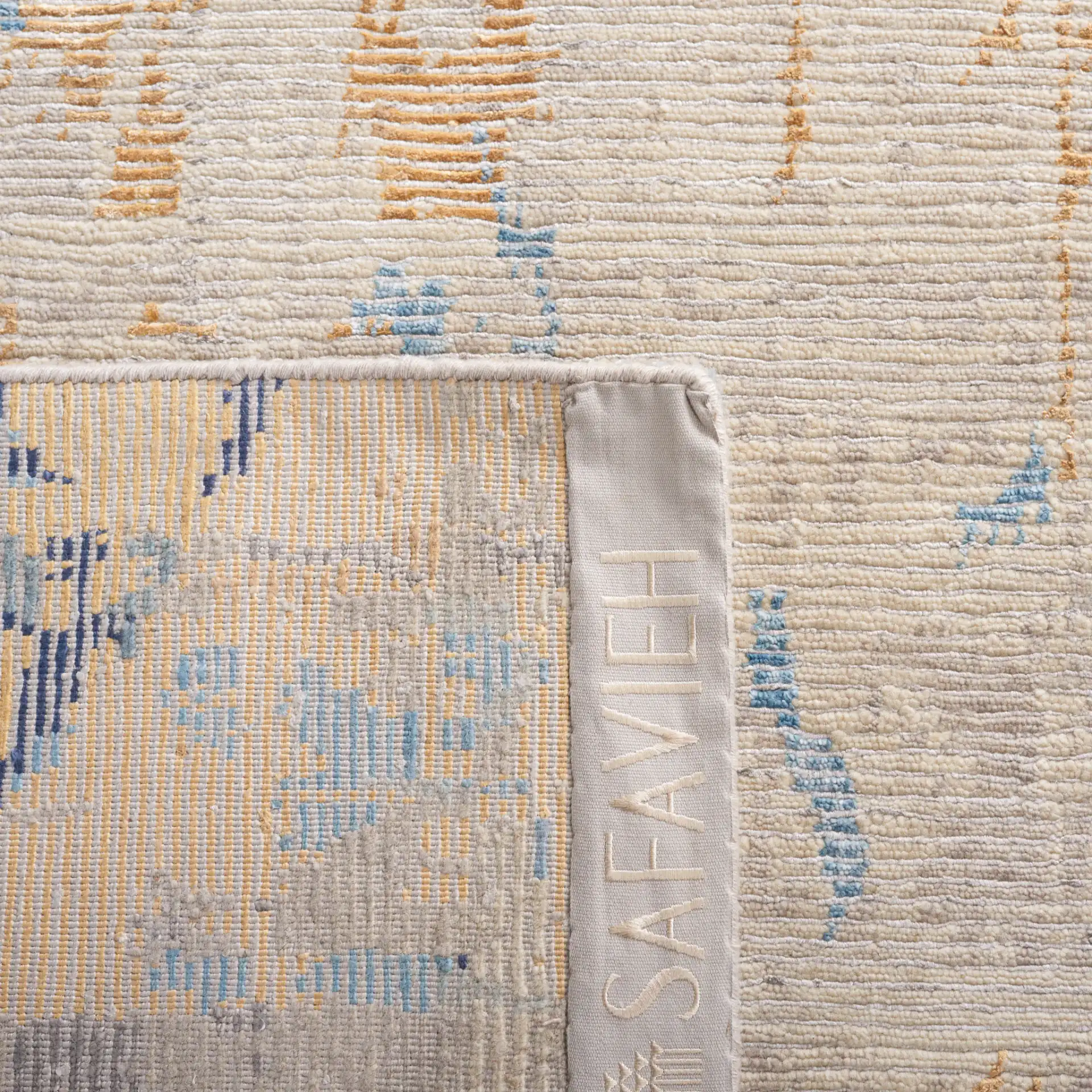 Tiffany Painterly Abstract Hand-Knotted Rug in Navy / Gold in a styled room
