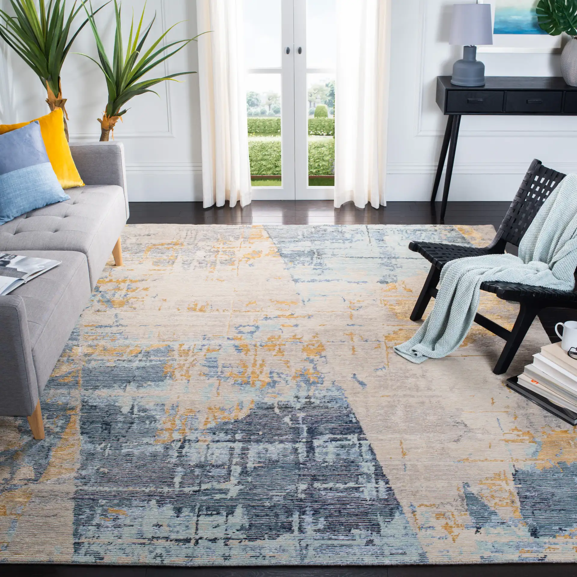 Tiffany Painterly Abstract Hand-Knotted Rug in Navy / Gold in a styled room