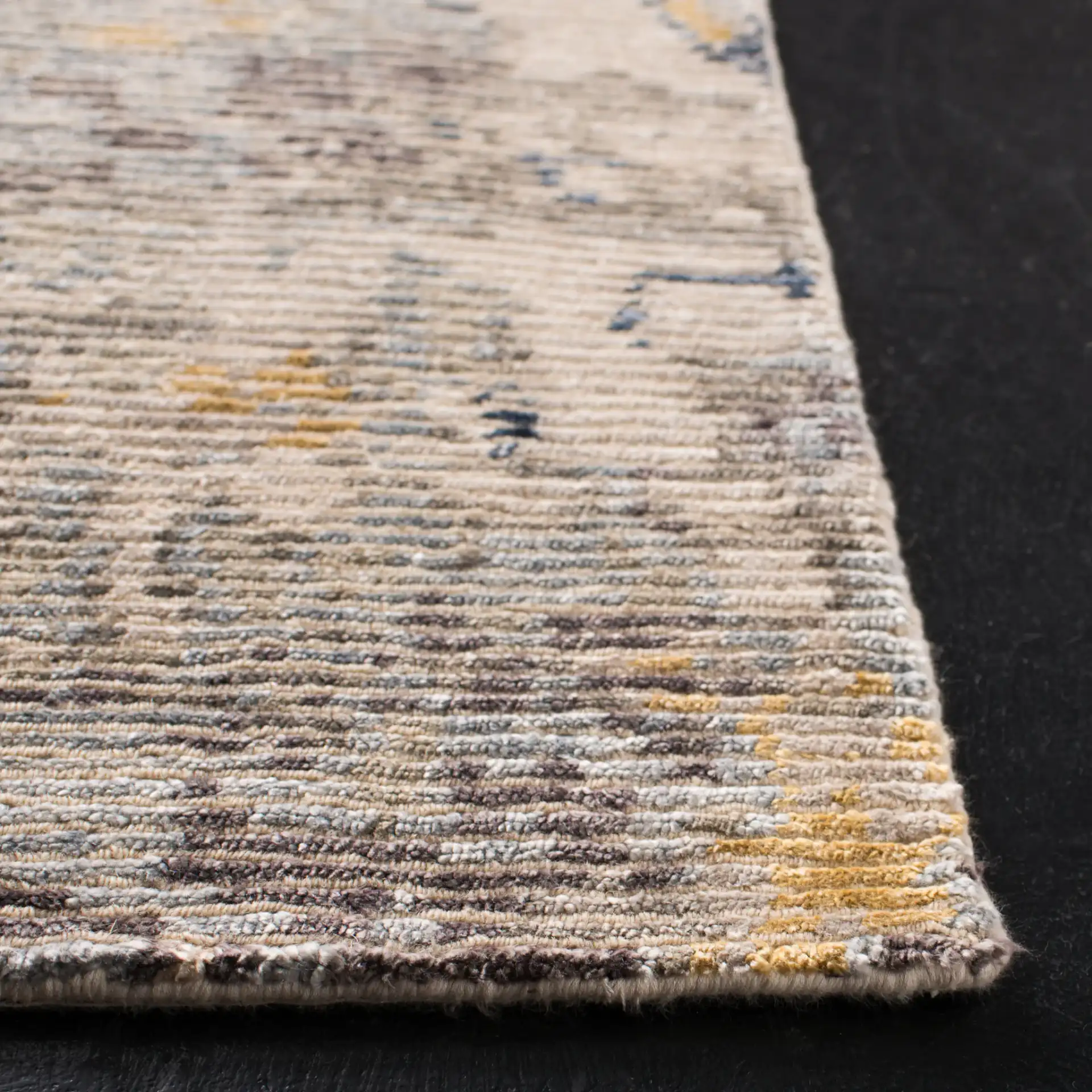 Tiffany Weathered Abstract Hand-Knotted Rug in Gray / Gold in a styled room
