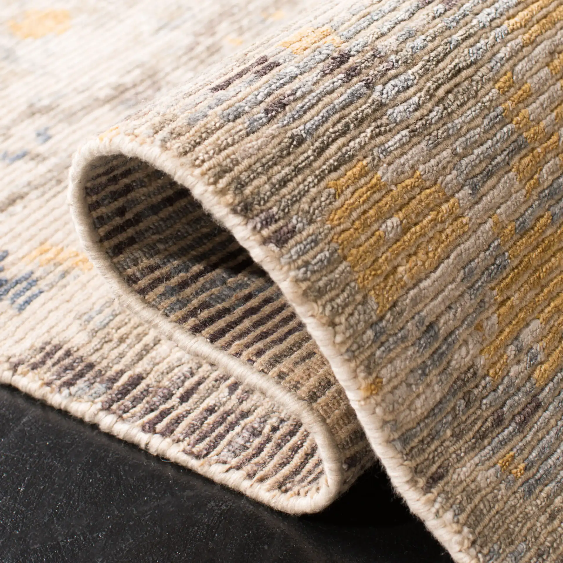 Tiffany Weathered Abstract Hand-Knotted Rug in Gray / Gold in a styled room