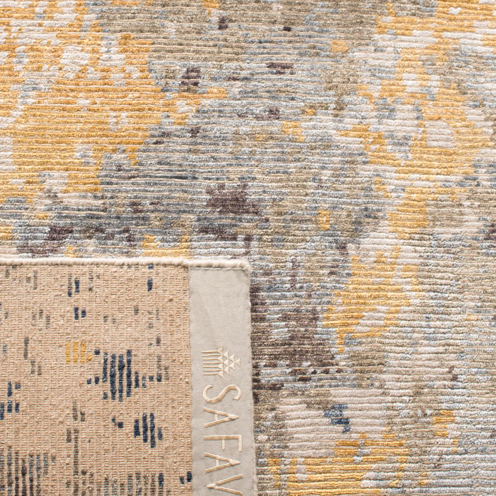 Tiffany Weathered Abstract Hand-Knotted Rug in Gray / Gold in a styled room