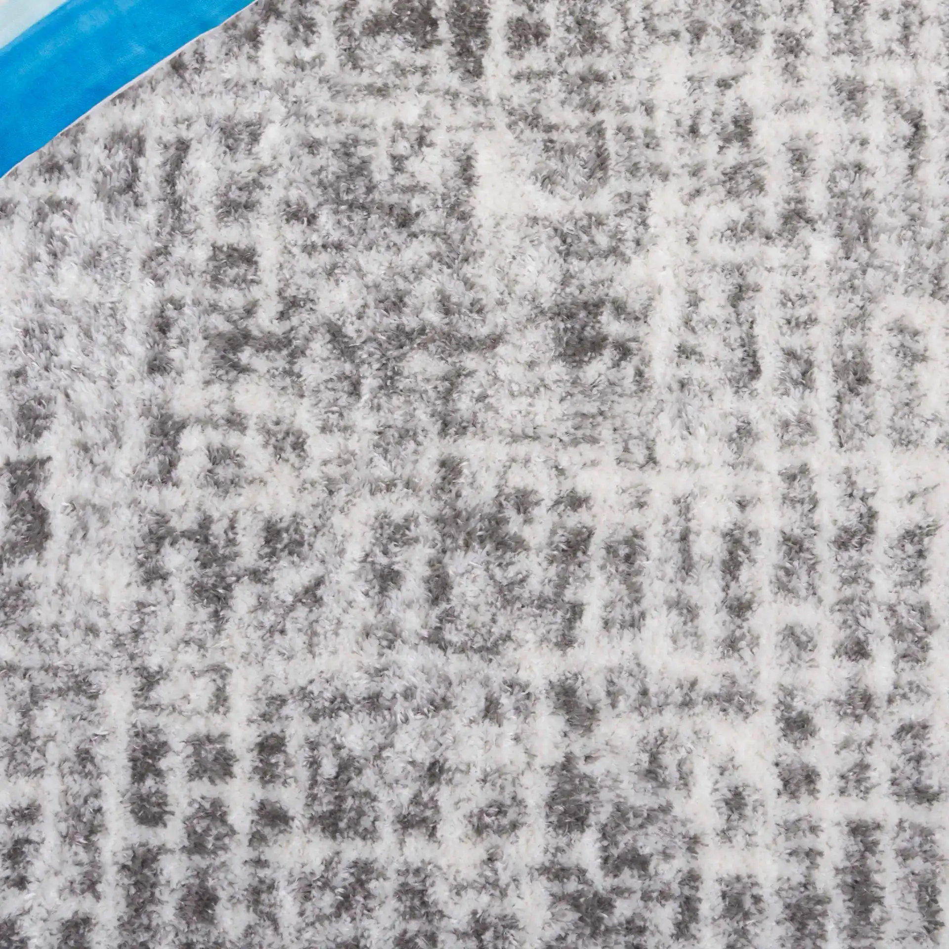 Tahoe Grid Shag Rug in Ivory / Gray in a styled room