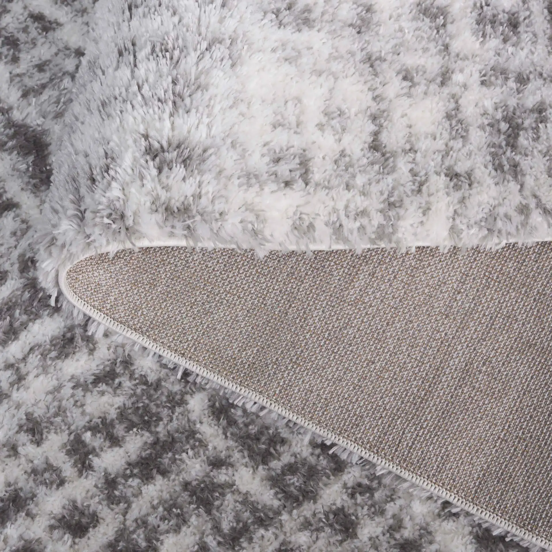 Tahoe Grid Shag Rug in Ivory / Gray in a styled room