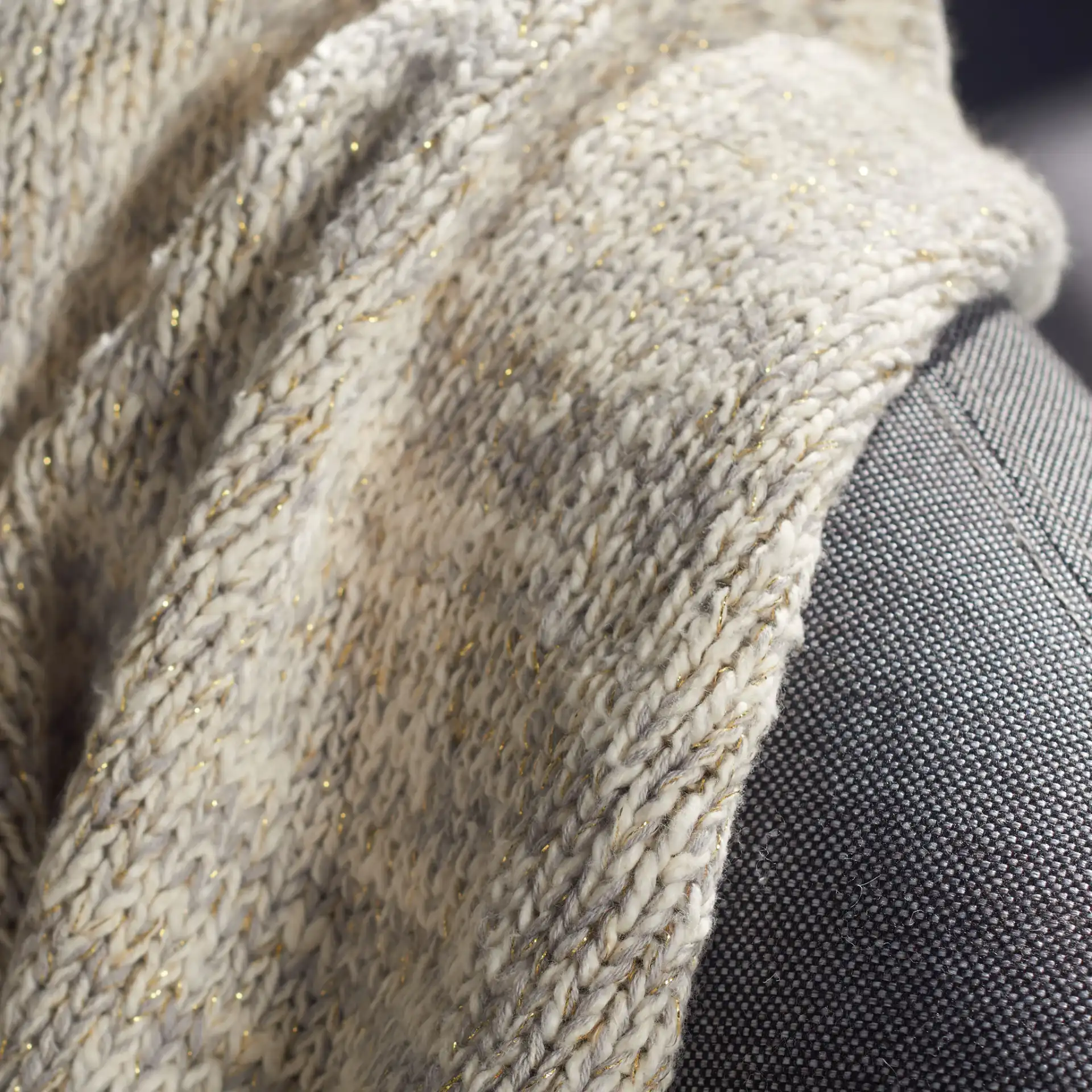 Panna Knit Throw in Gray in a styled room