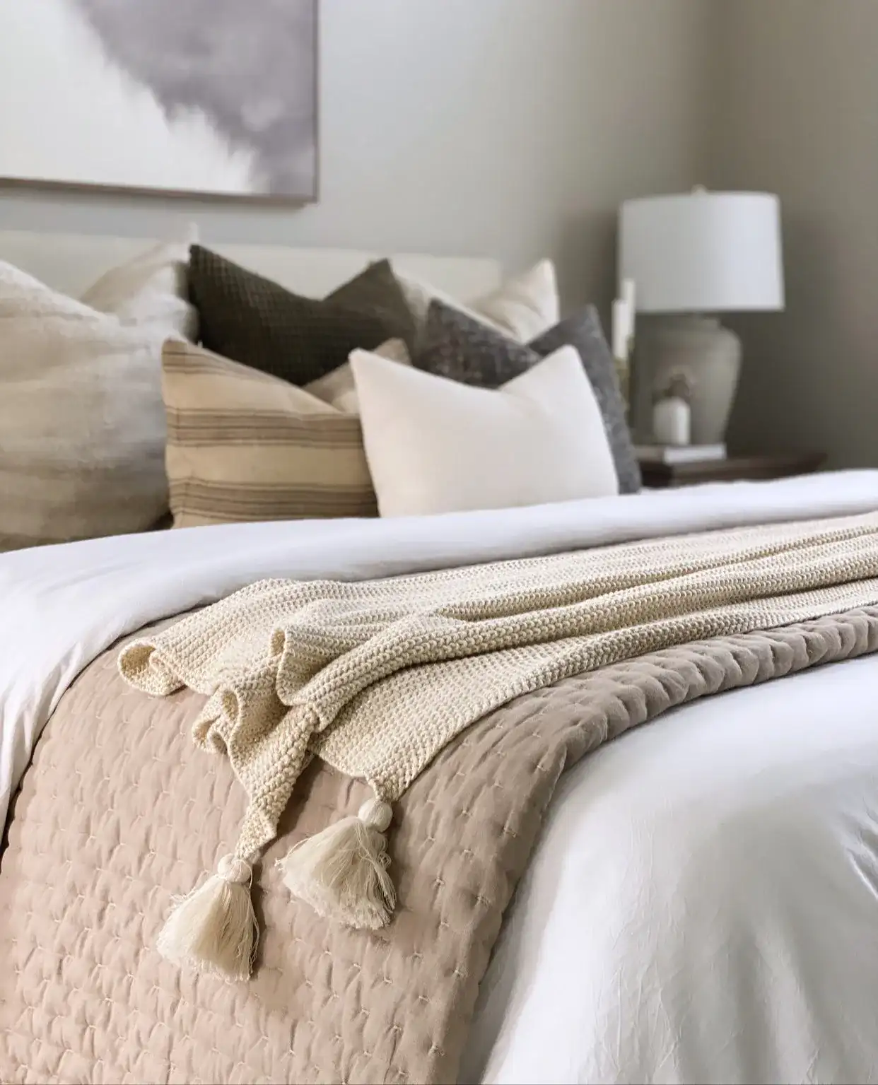 Mari Throw in Beige / Gold in a styled room