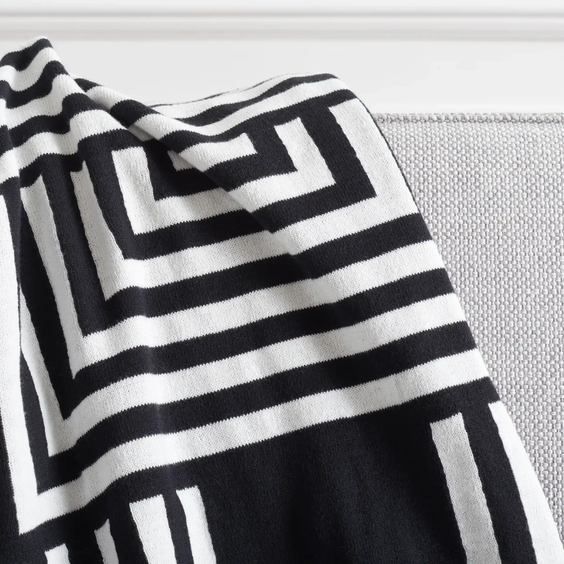 Ziggy Throw in Black / Ivory in a styled room