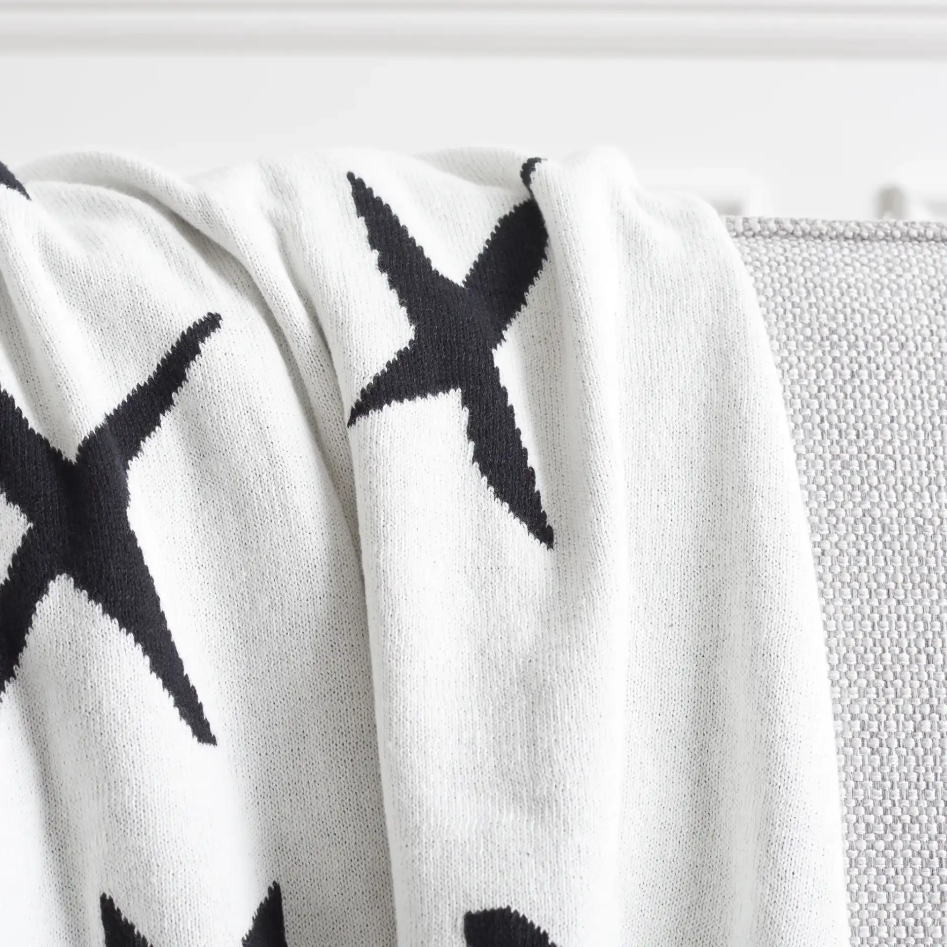 Alto Throw in Black / Ivory in a styled room