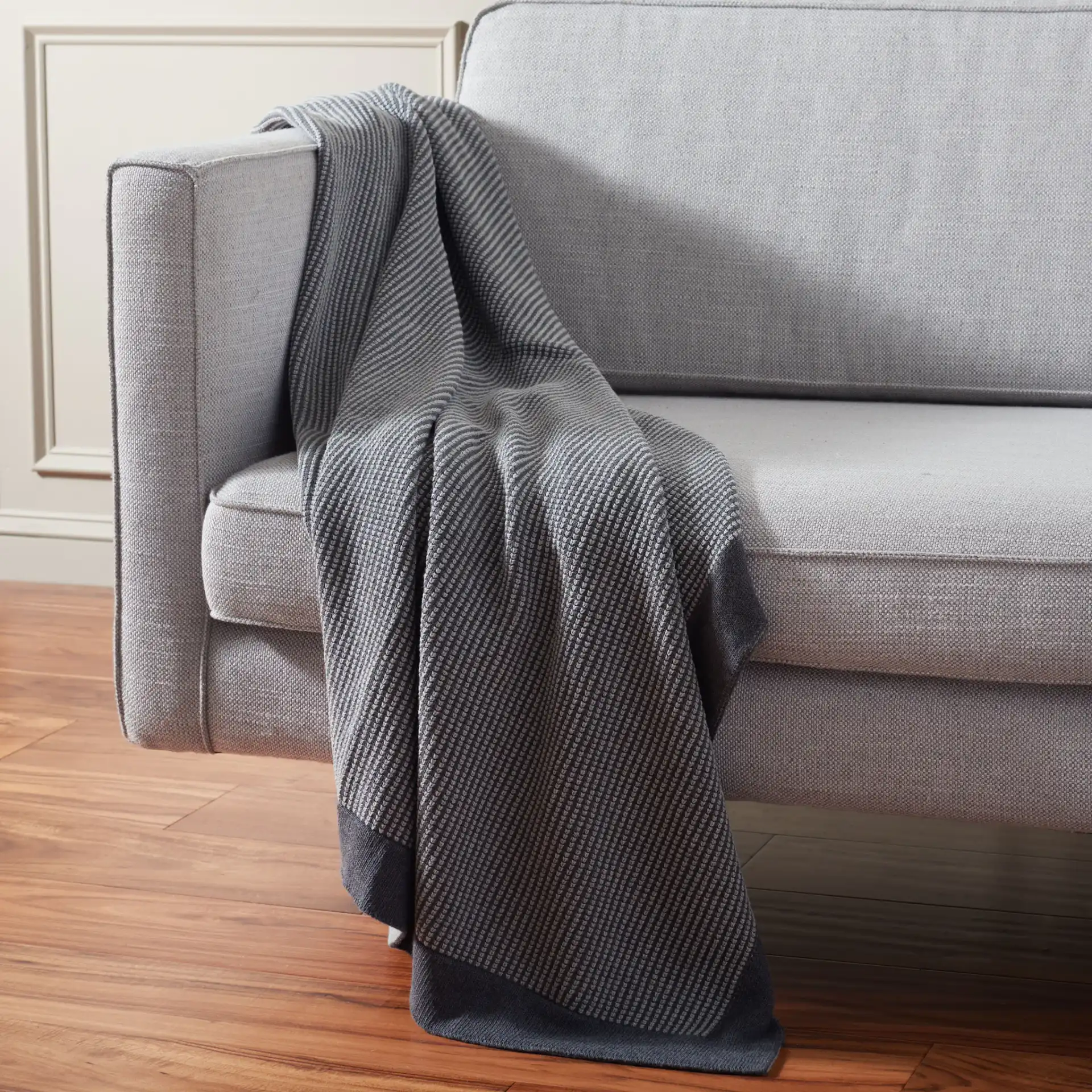 Franca 50X60 Throw in Gray in a styled room