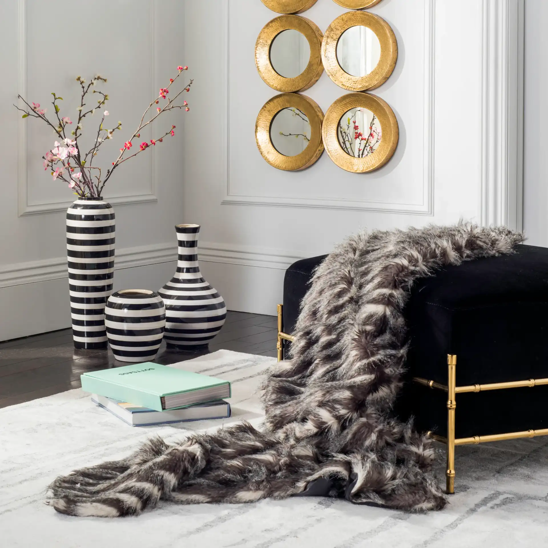 Faux Pheasant Throw in Navy in a styled room