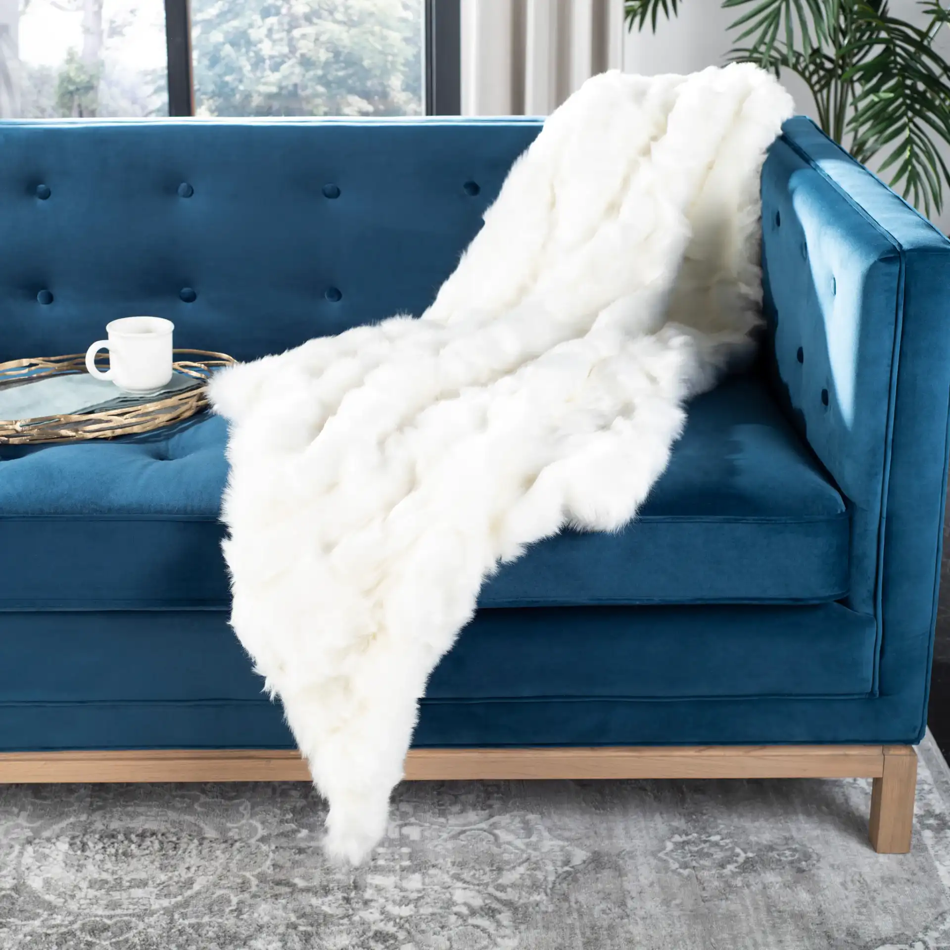 Textured Throw in Cream in a styled room