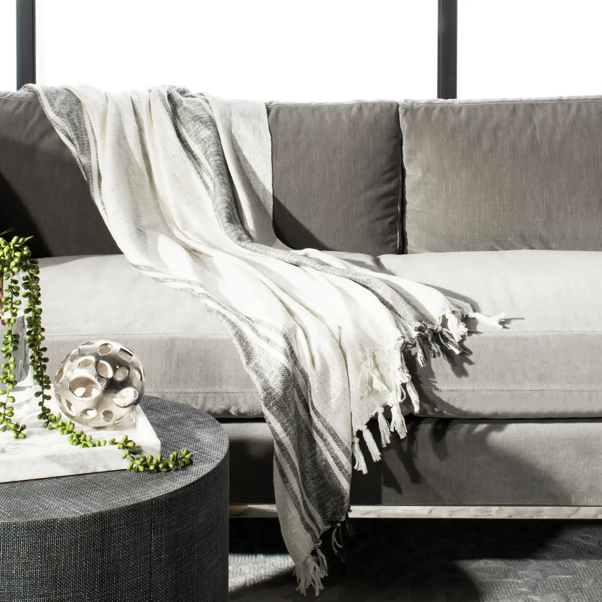 Alita Metallic Throw in Robins Egg Blue in a styled room