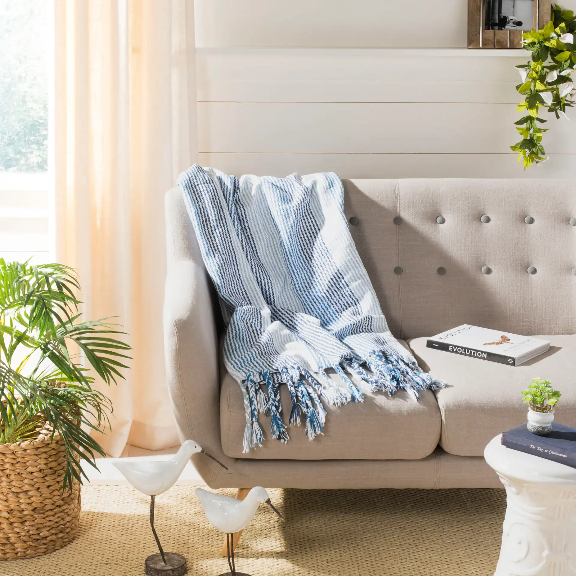 Brenton Throw in White in a styled room