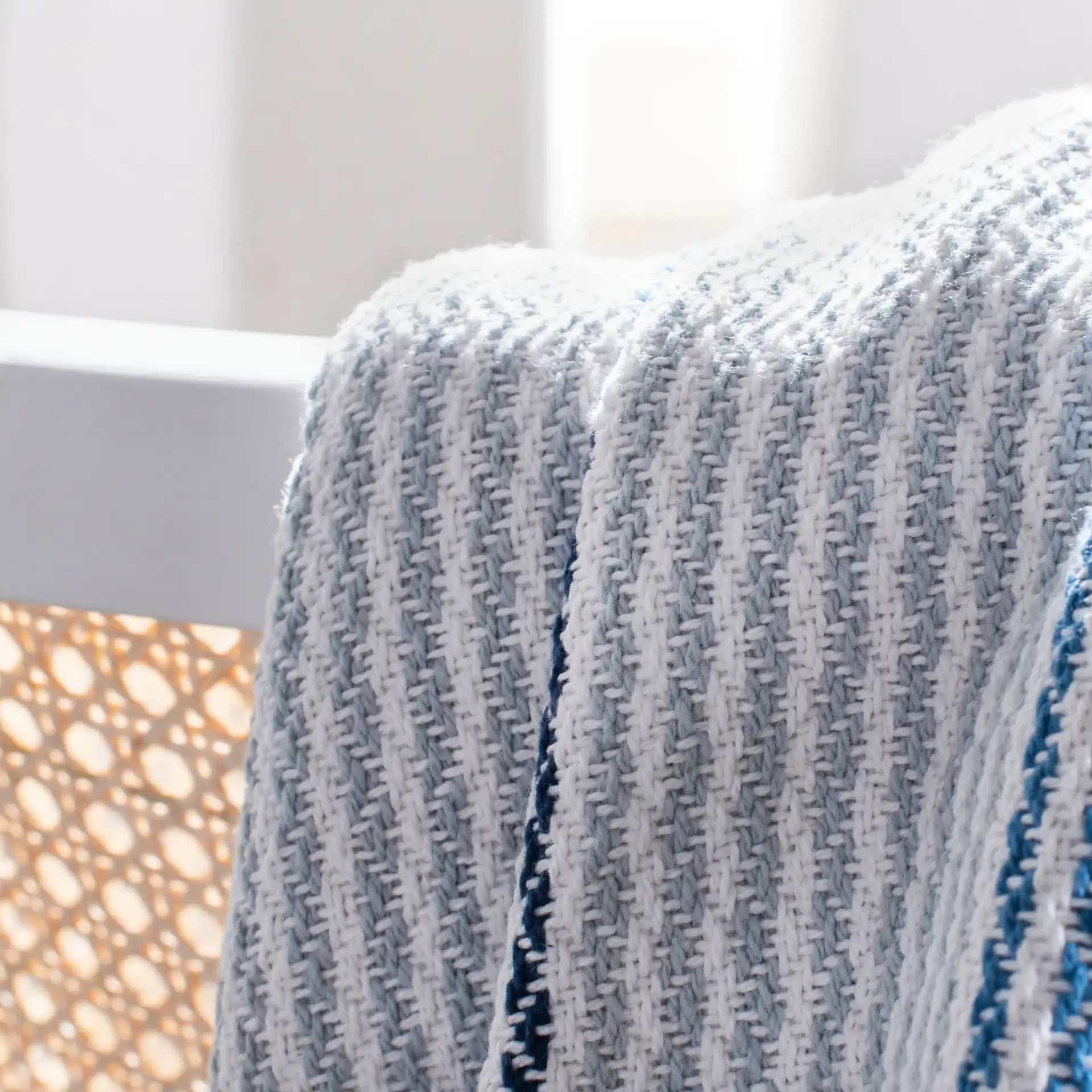 Brenton Throw in White in a styled room