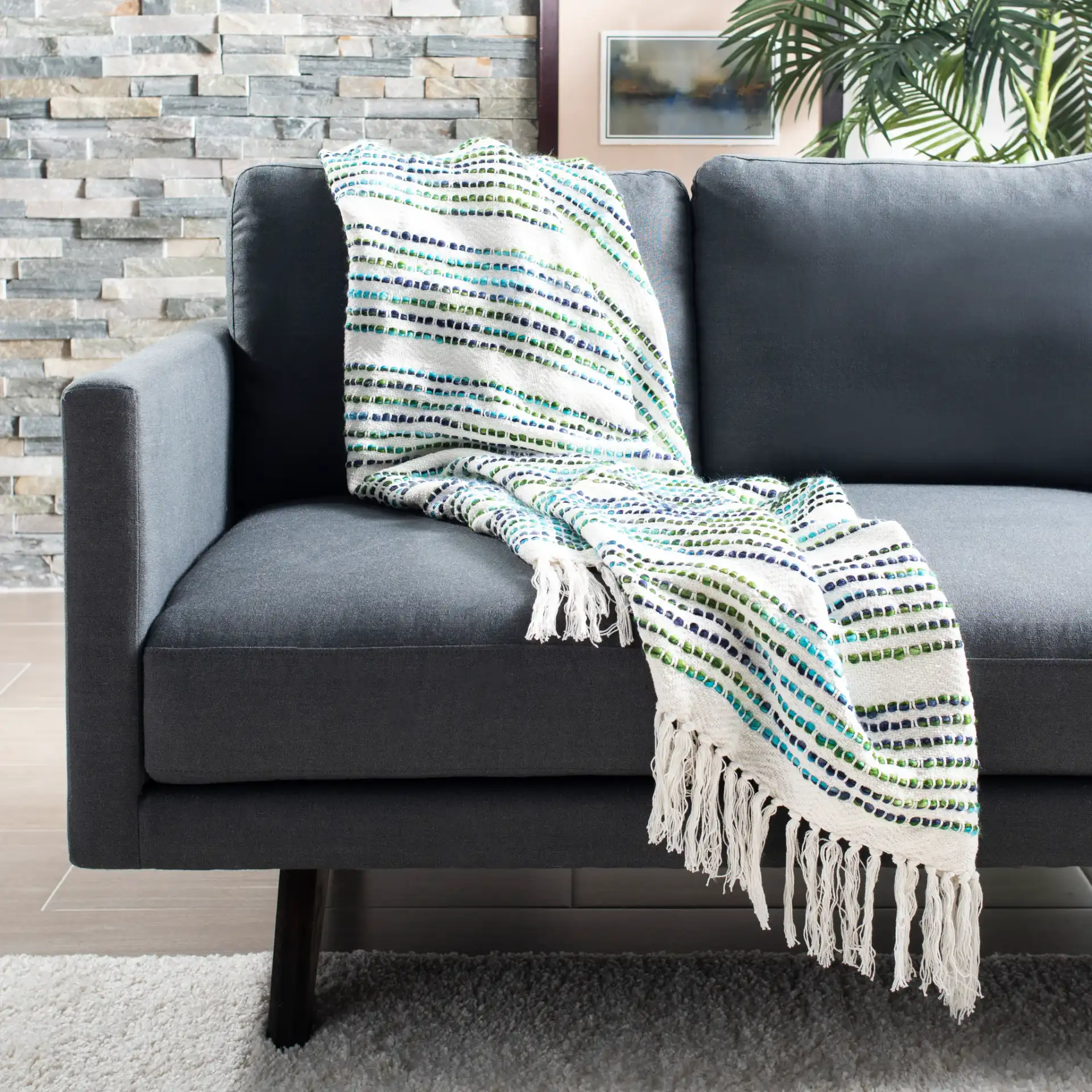 Landra Throw in Cream in a styled room