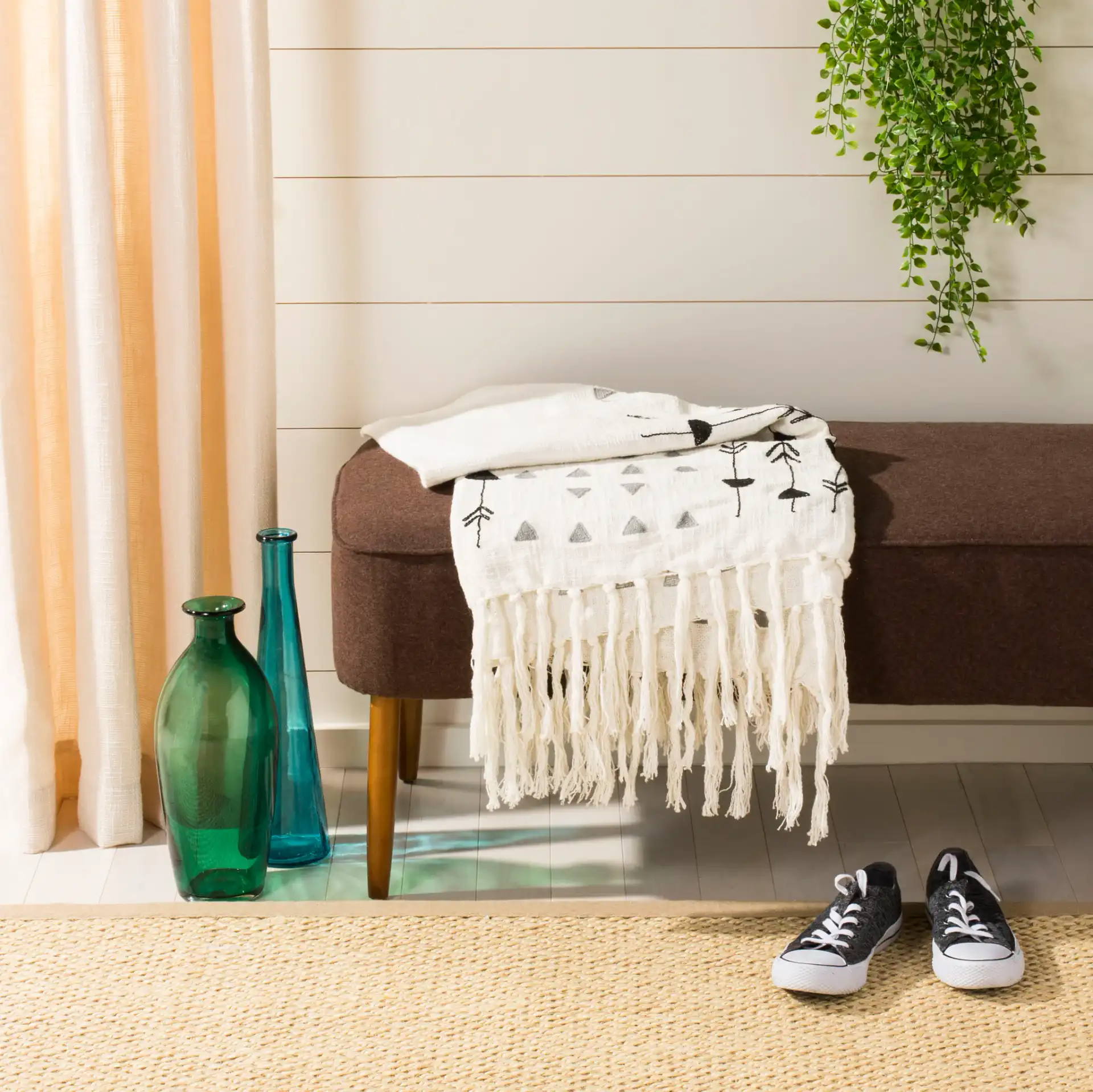 Penton Throw in Gray / White in a styled room