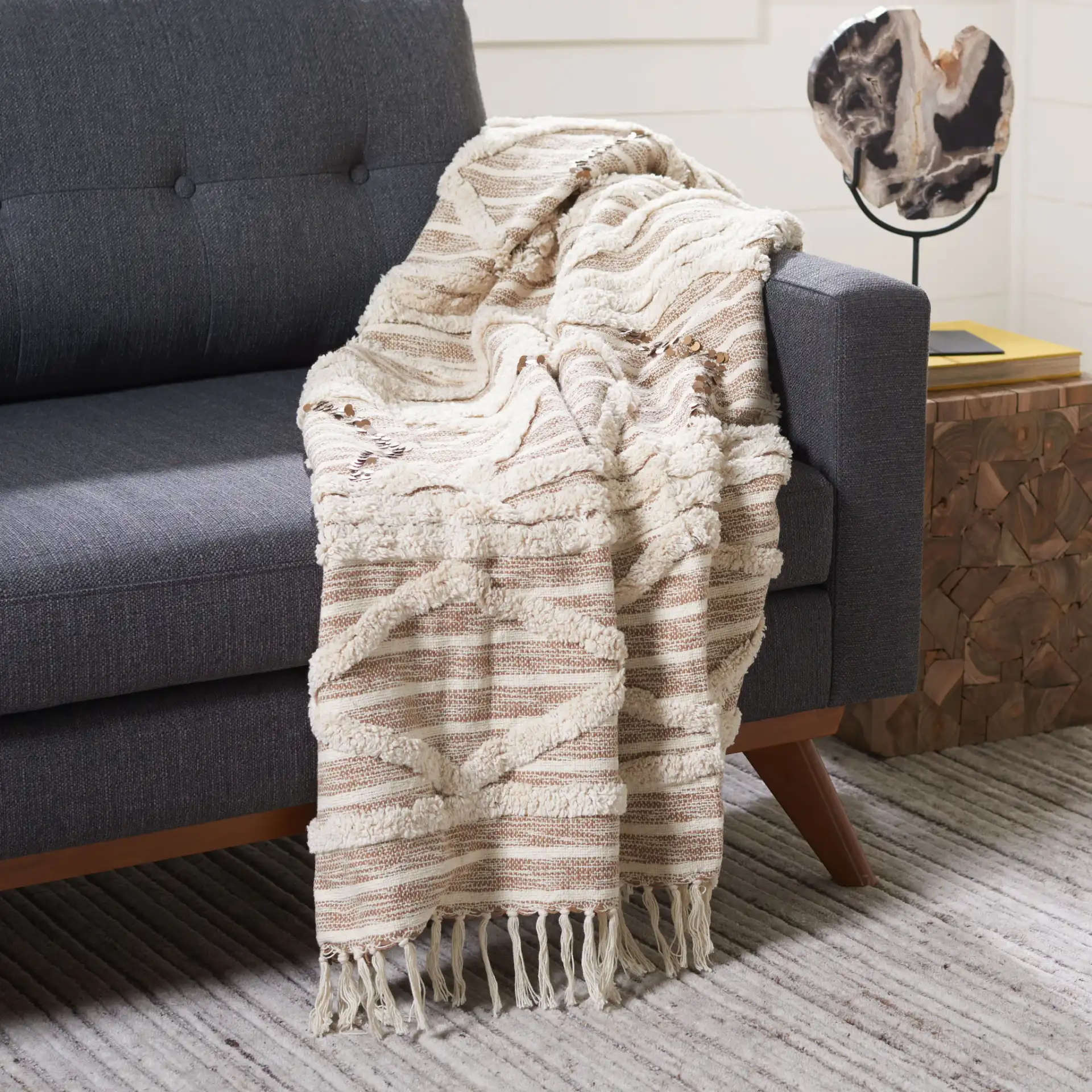 Renali Throw in Gold in a styled room