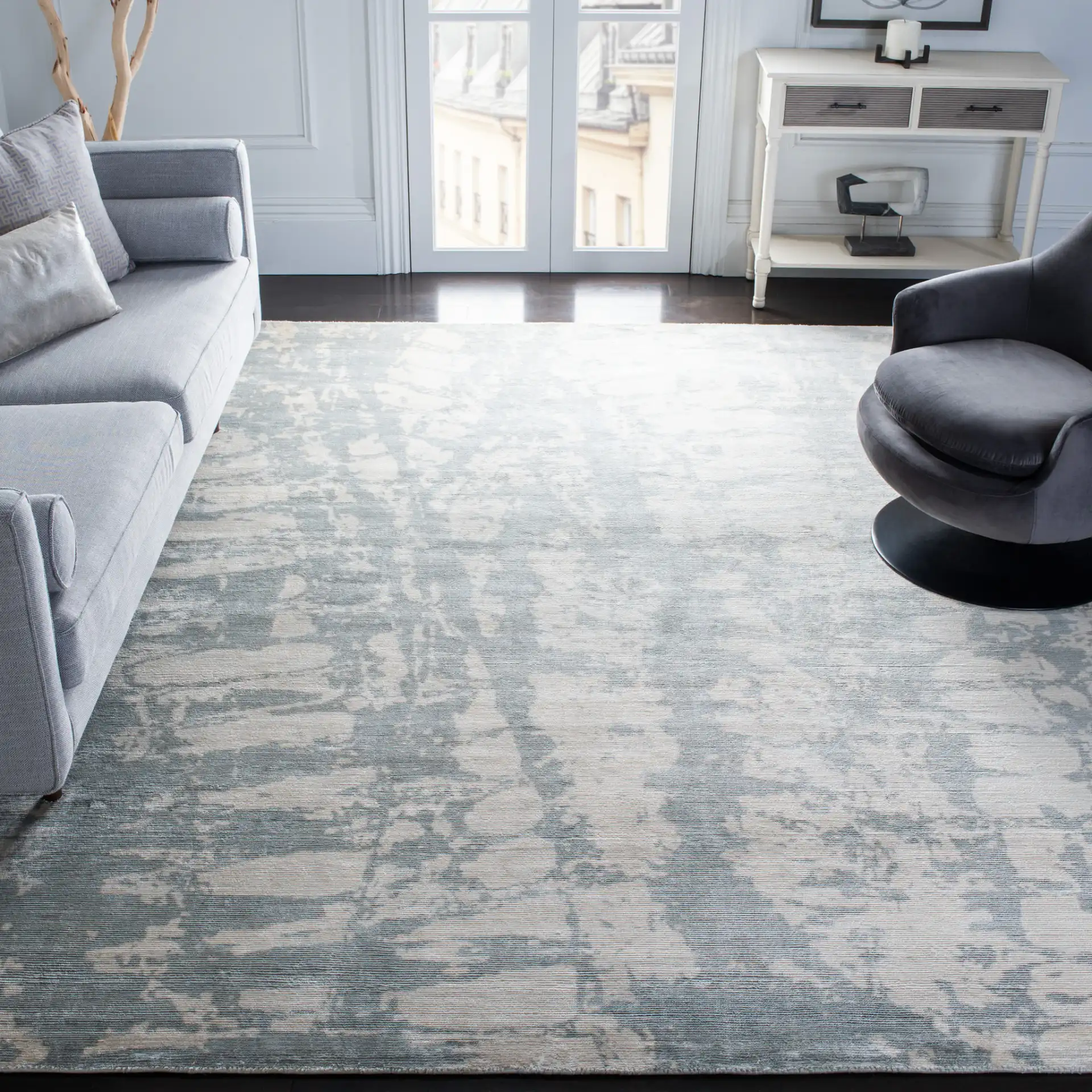 Tibetan Distressed Abstract Hand-Loomed Viscose Rug in Light Gray in a styled room