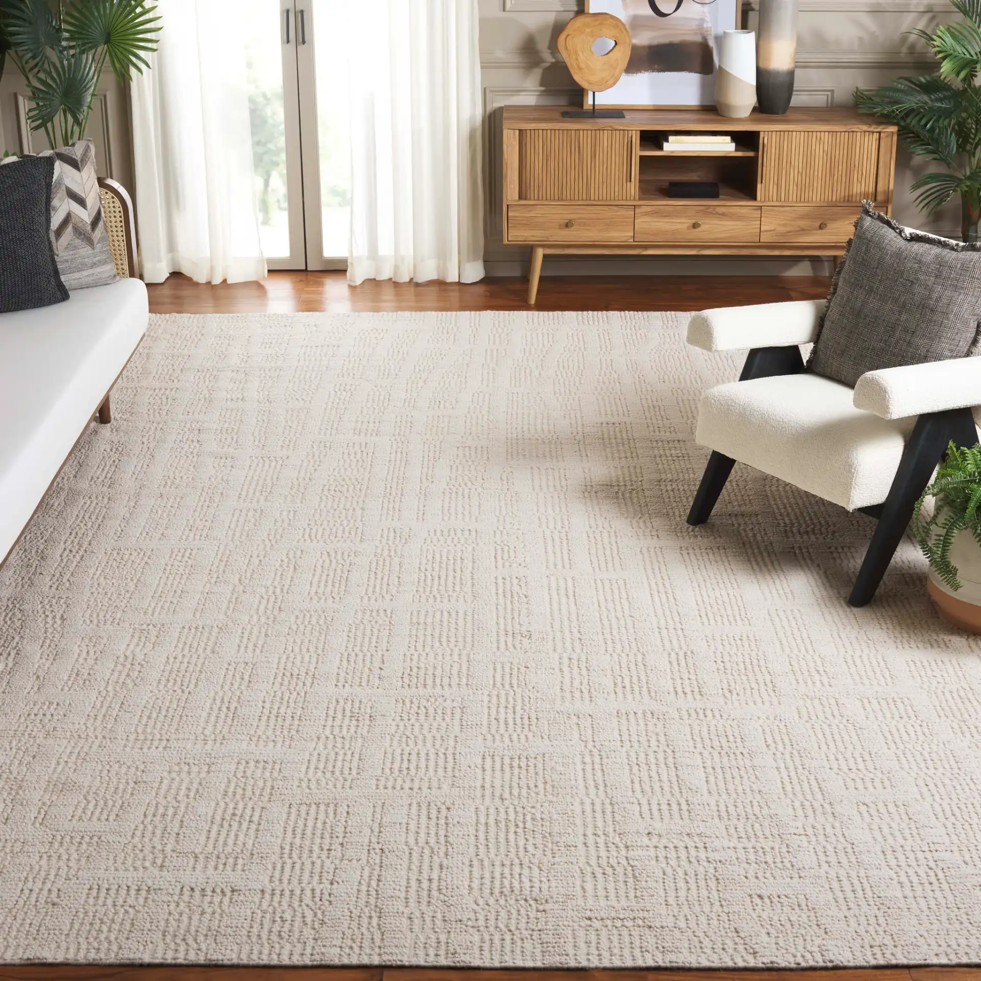 Tibetan Textured Grid Hand-Knotted Wool Rug in Ivory in a styled room