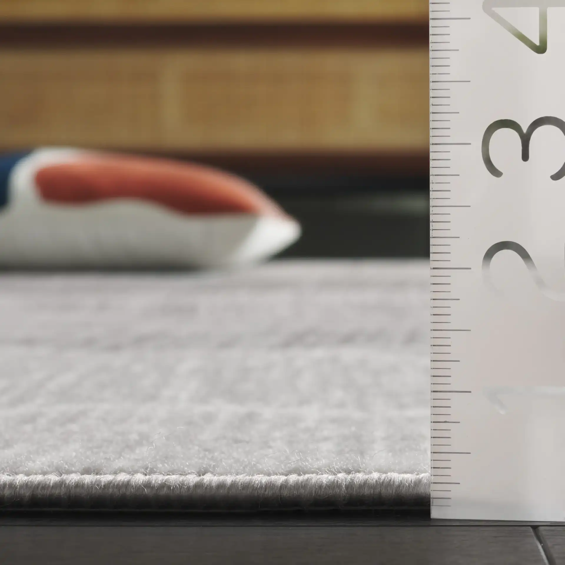 Temple Wave Rug in Gray / Dark Gray in a styled room