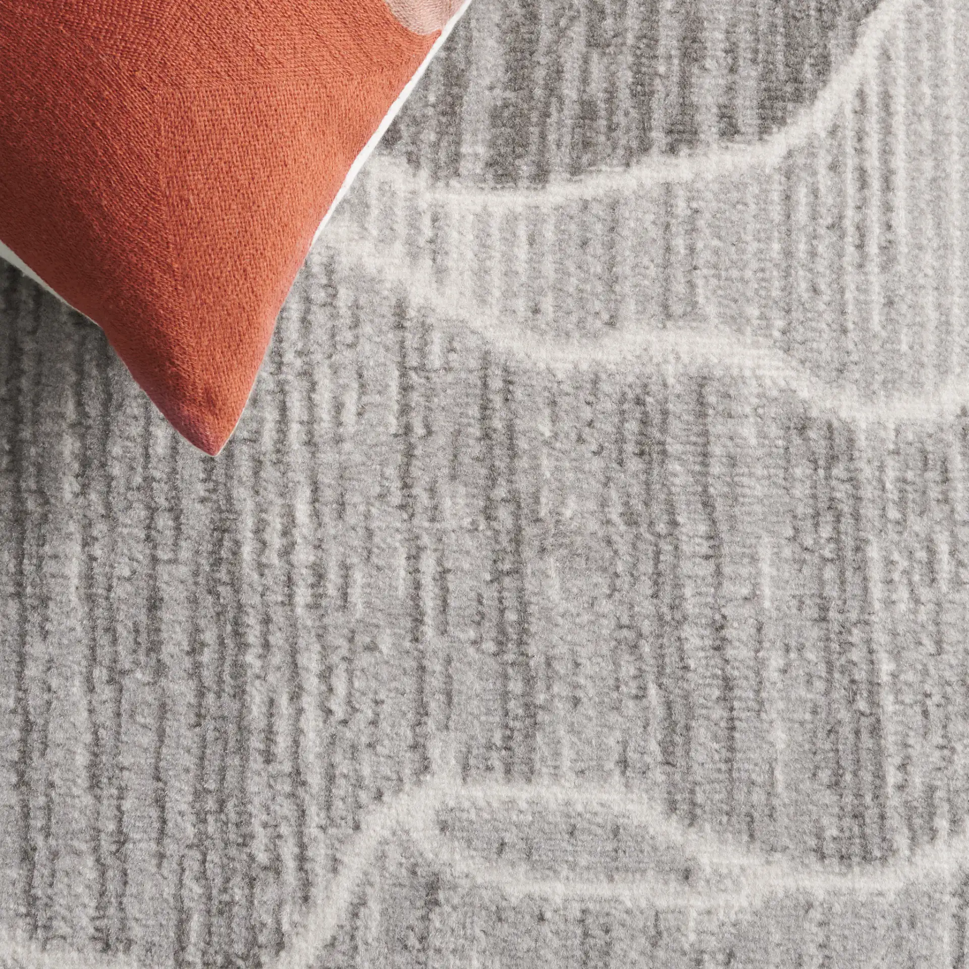 Temple Wave Rug in Gray / Dark Gray in a styled room