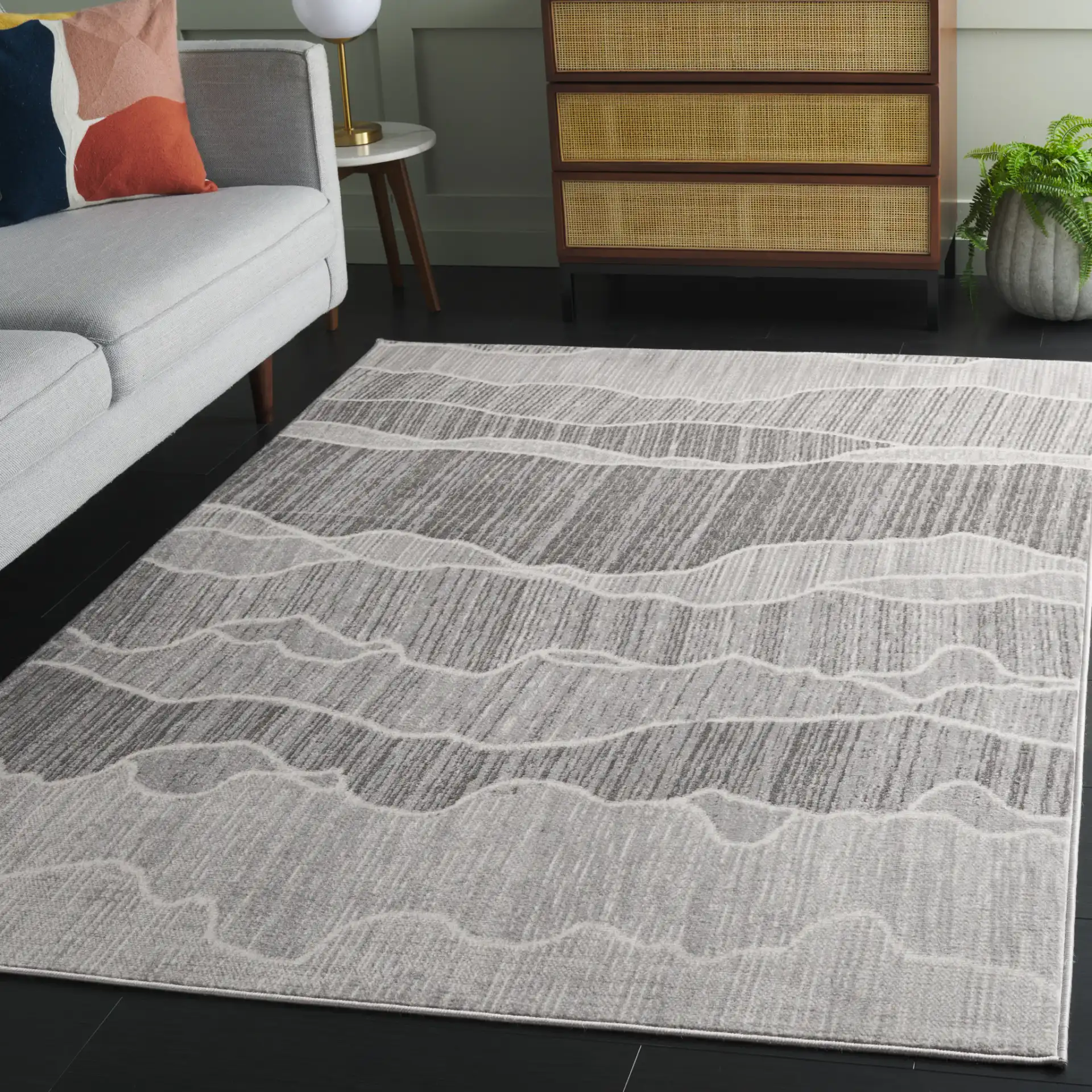 Temple Wave Rug in Gray / Dark Gray in a styled room