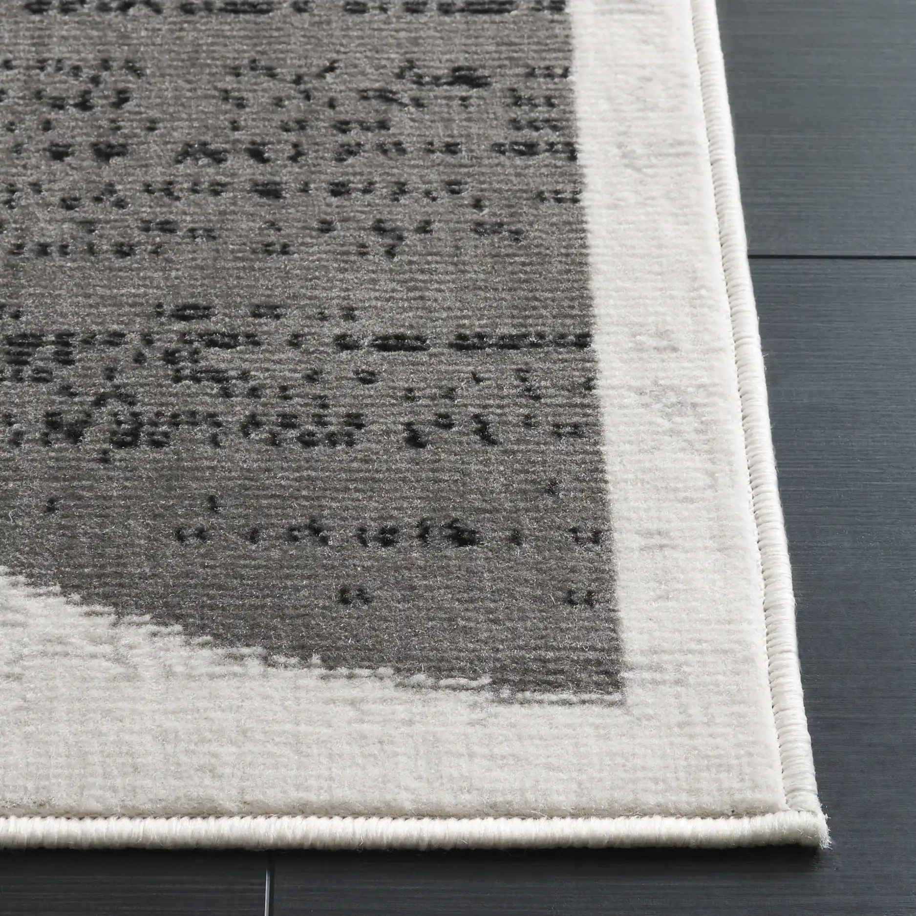 Temple Concentric Arcs Rug in Ivory / Gray in a styled room