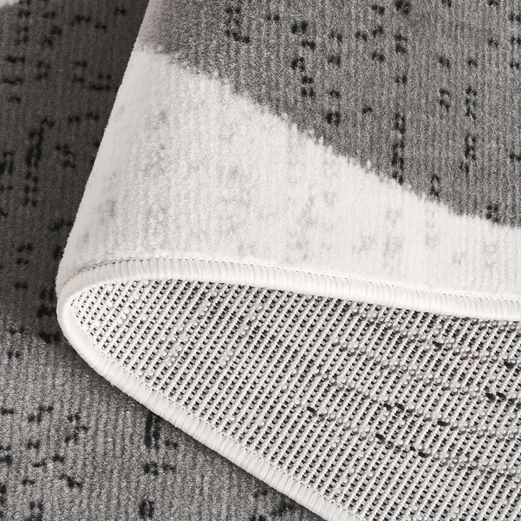 Temple Concentric Arcs Rug in Ivory / Gray in a styled room