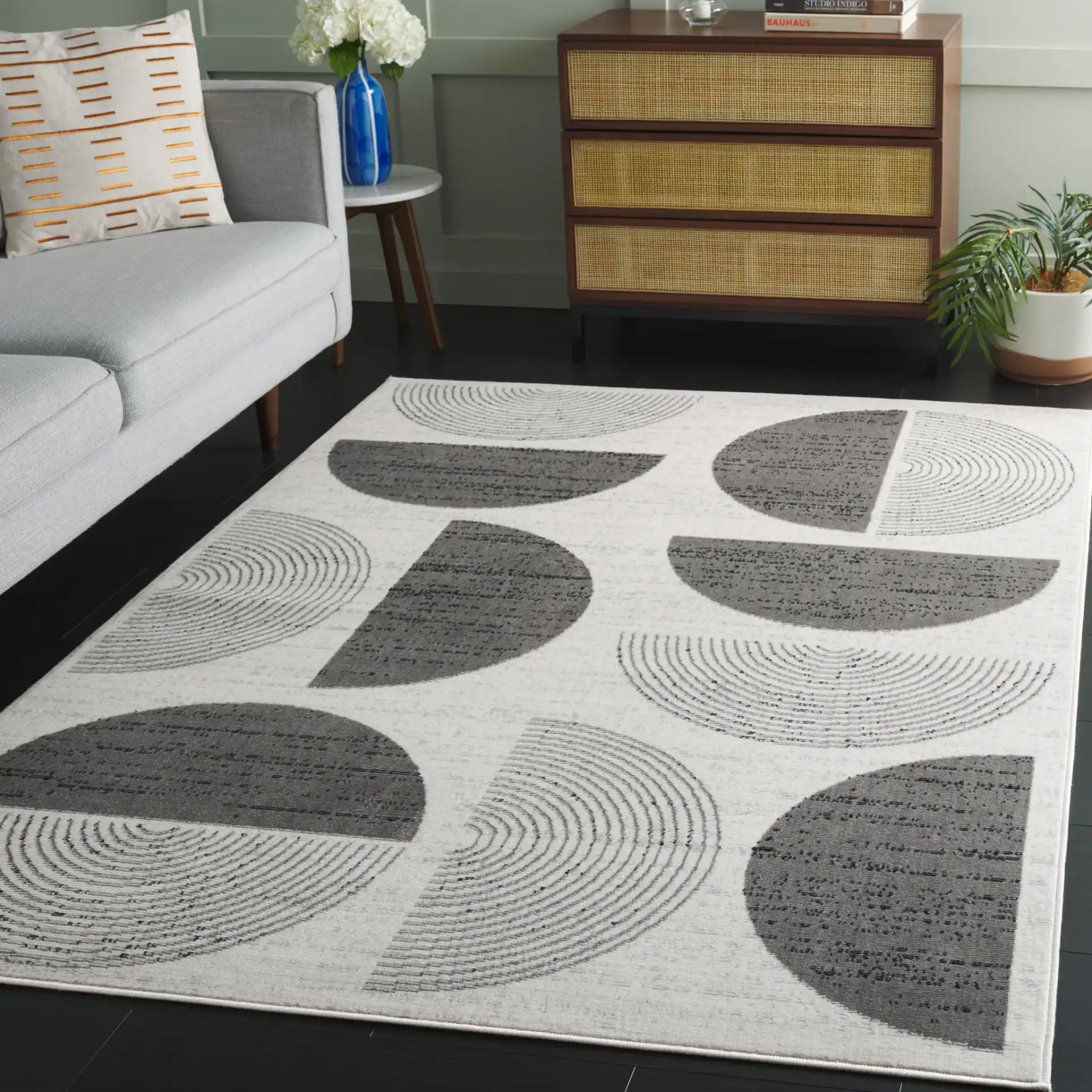 Temple Concentric Arcs Rug in Ivory / Gray in a styled room