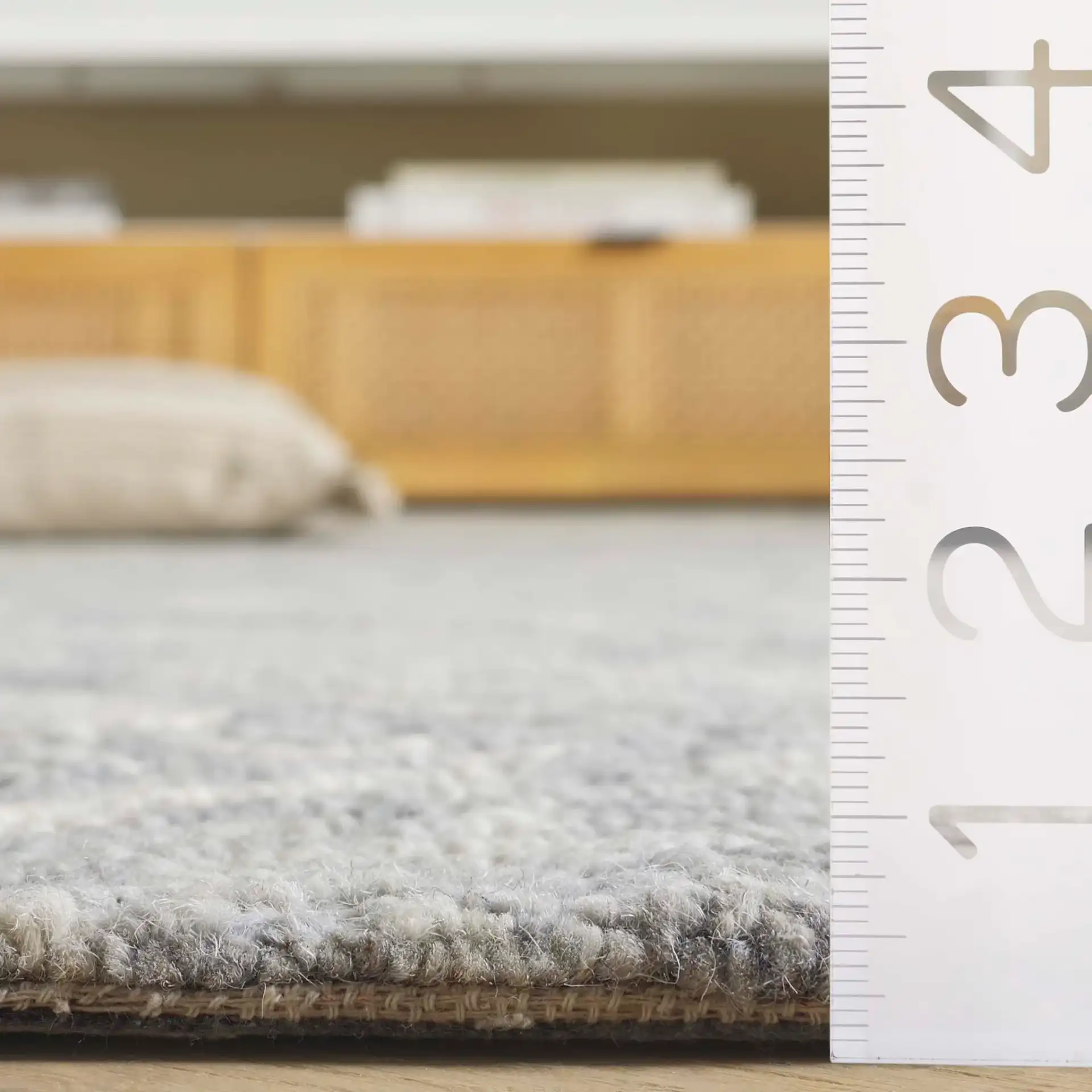 Trace Concentric Diamond Hand-Tufted Wool Rug in Gray in a styled room