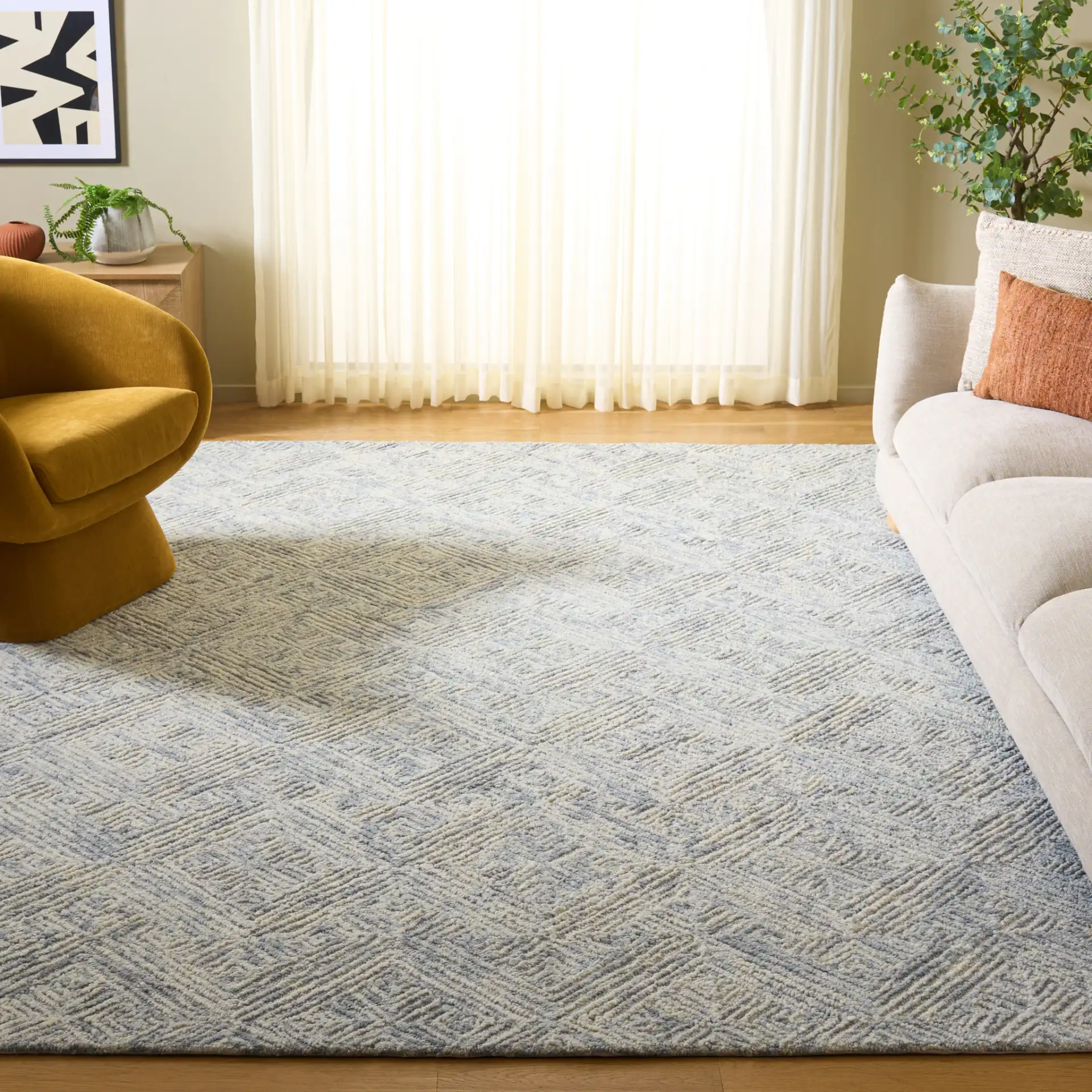 Trace Concentric Diamond Hand-Tufted Wool Rug in Gray in a styled room