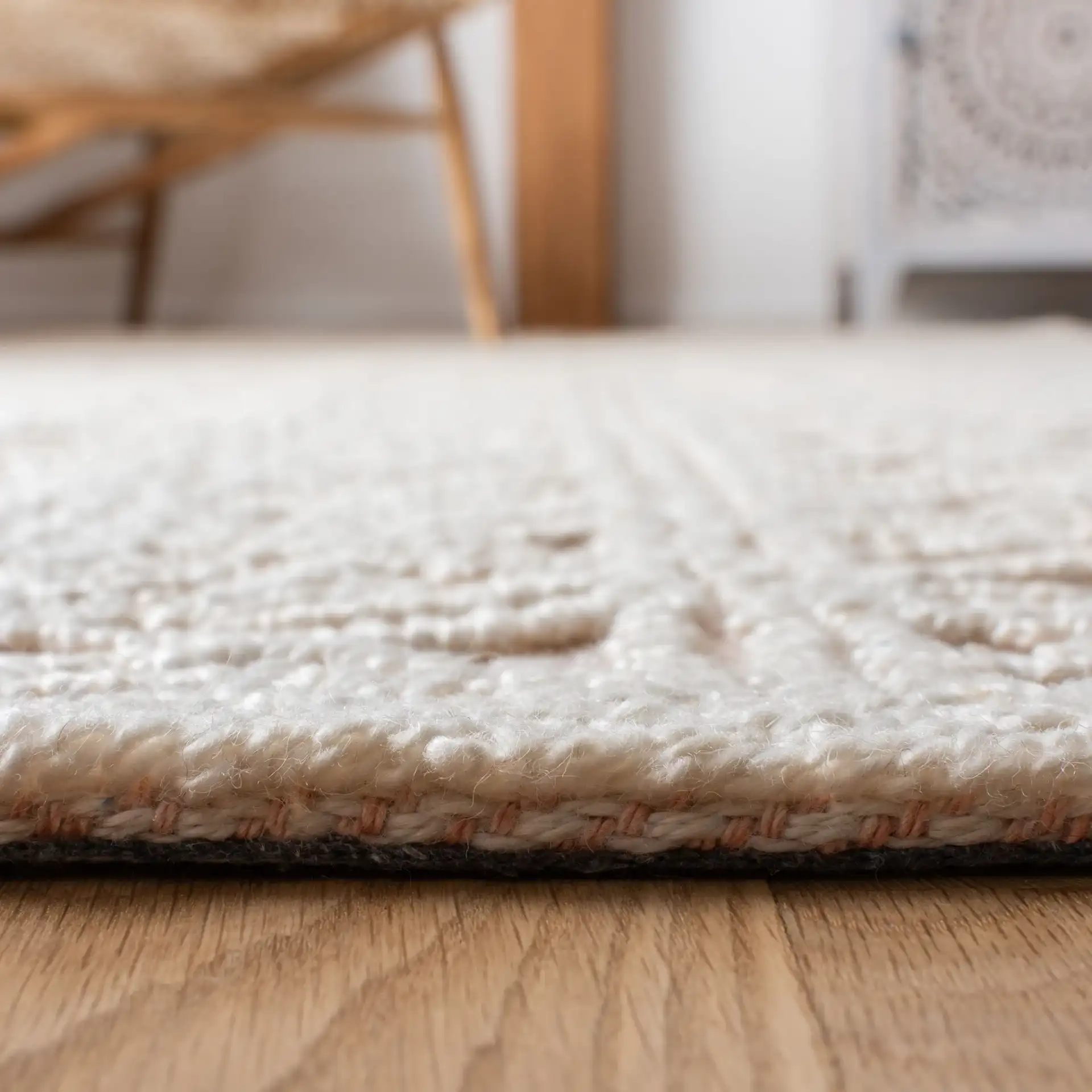 Trace Diamond Column Hand-Tufted Wool Blend Rug in Beige / Pink in a styled room
