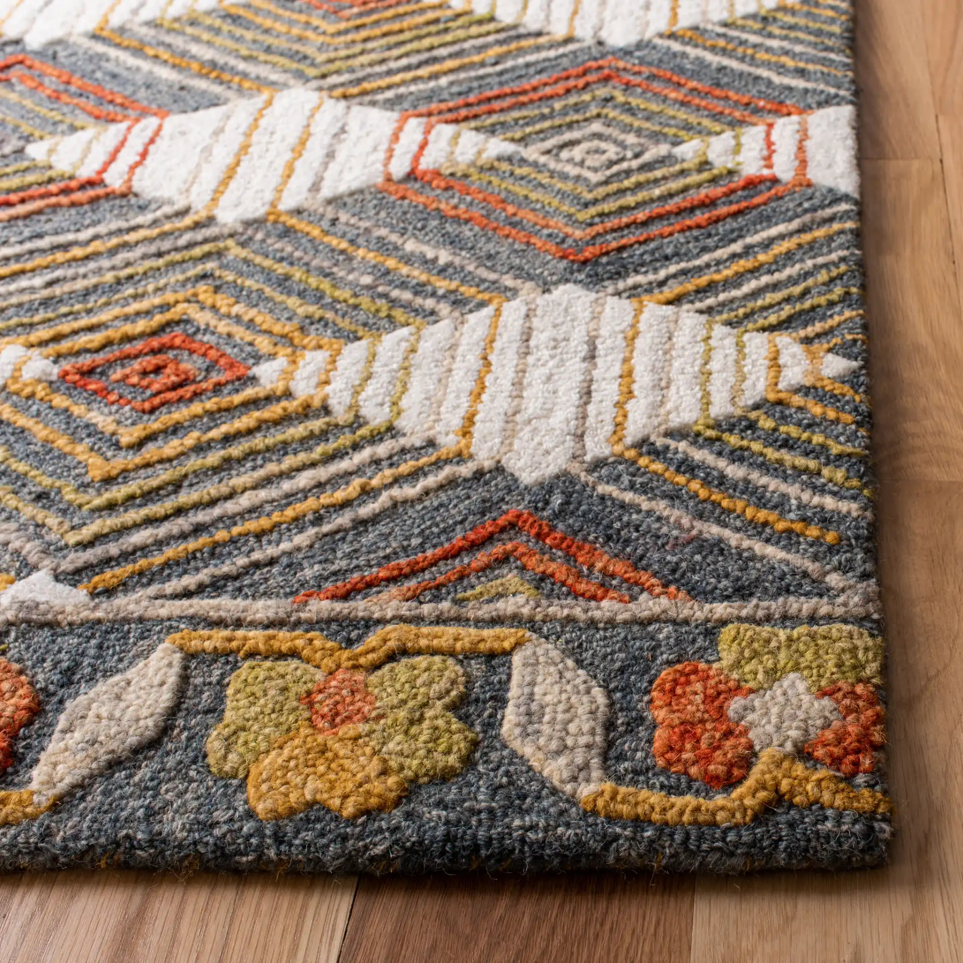 Trace Diamond Grid Hand-Tufted Wool Rug in Blue / Ivory in a styled room