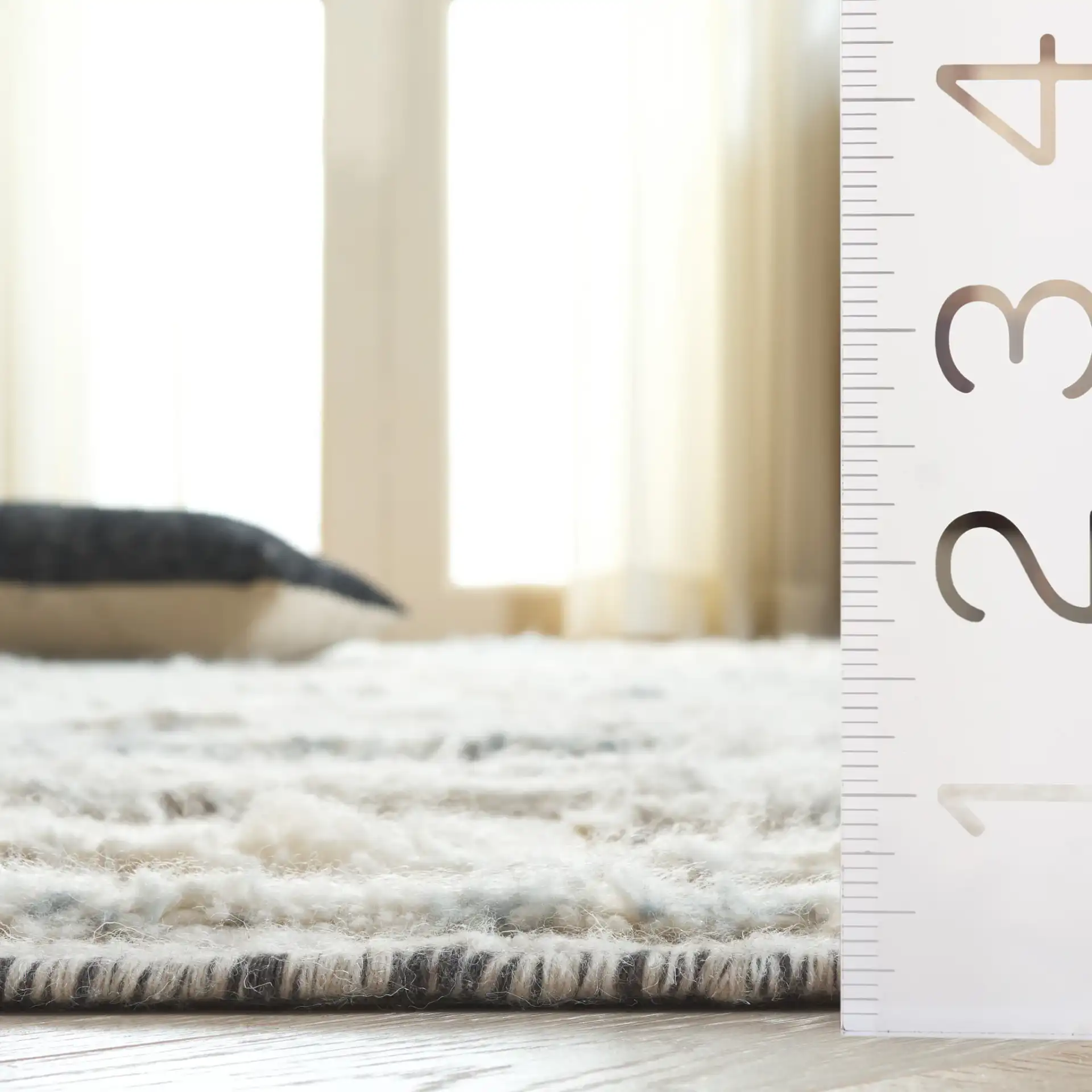 Tribeca Striated Abstract Hand-Knotted Wool Rug in Blue / Gray in a styled room