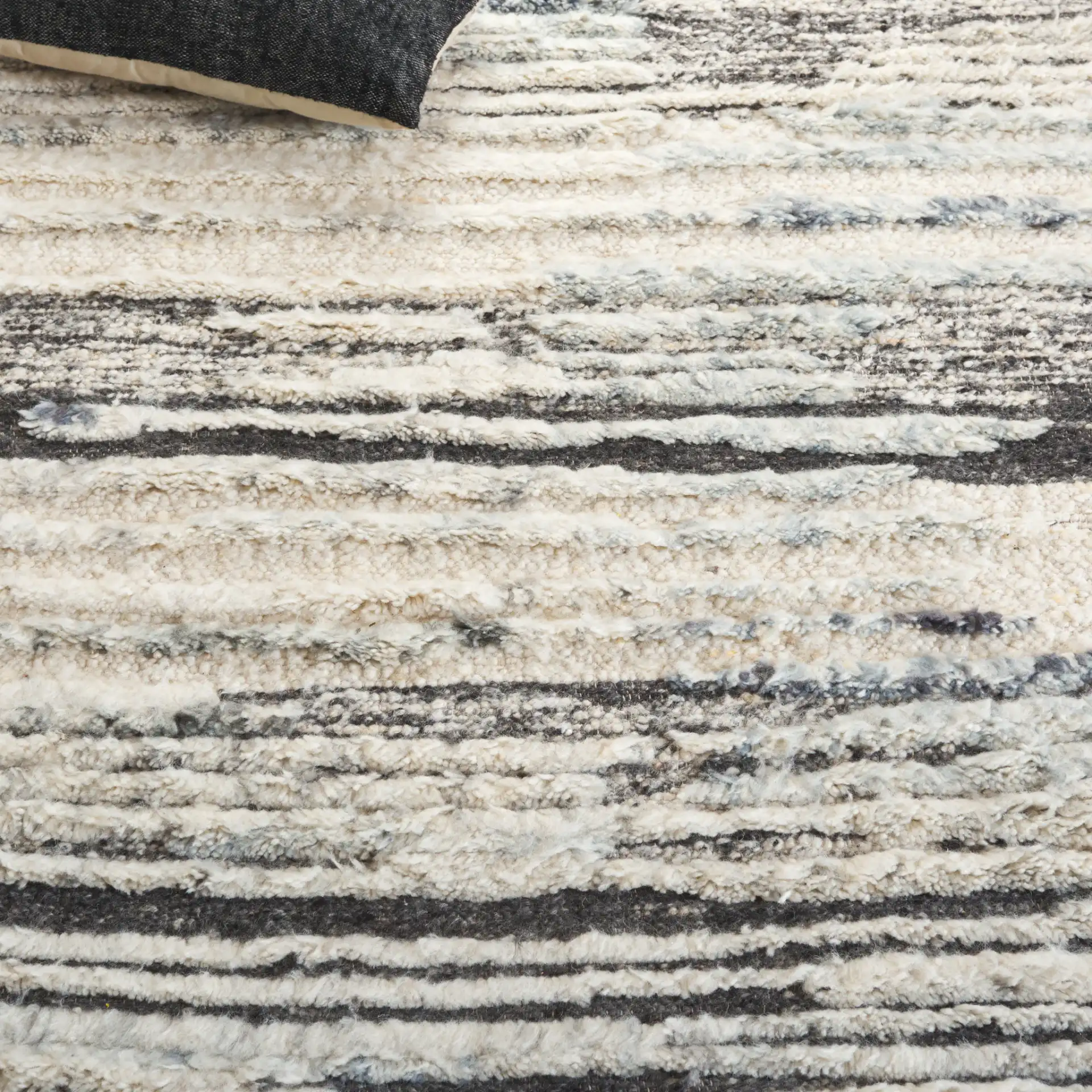 Tribeca Striated Abstract Hand-Knotted Wool Rug in Blue / Gray in a styled room
