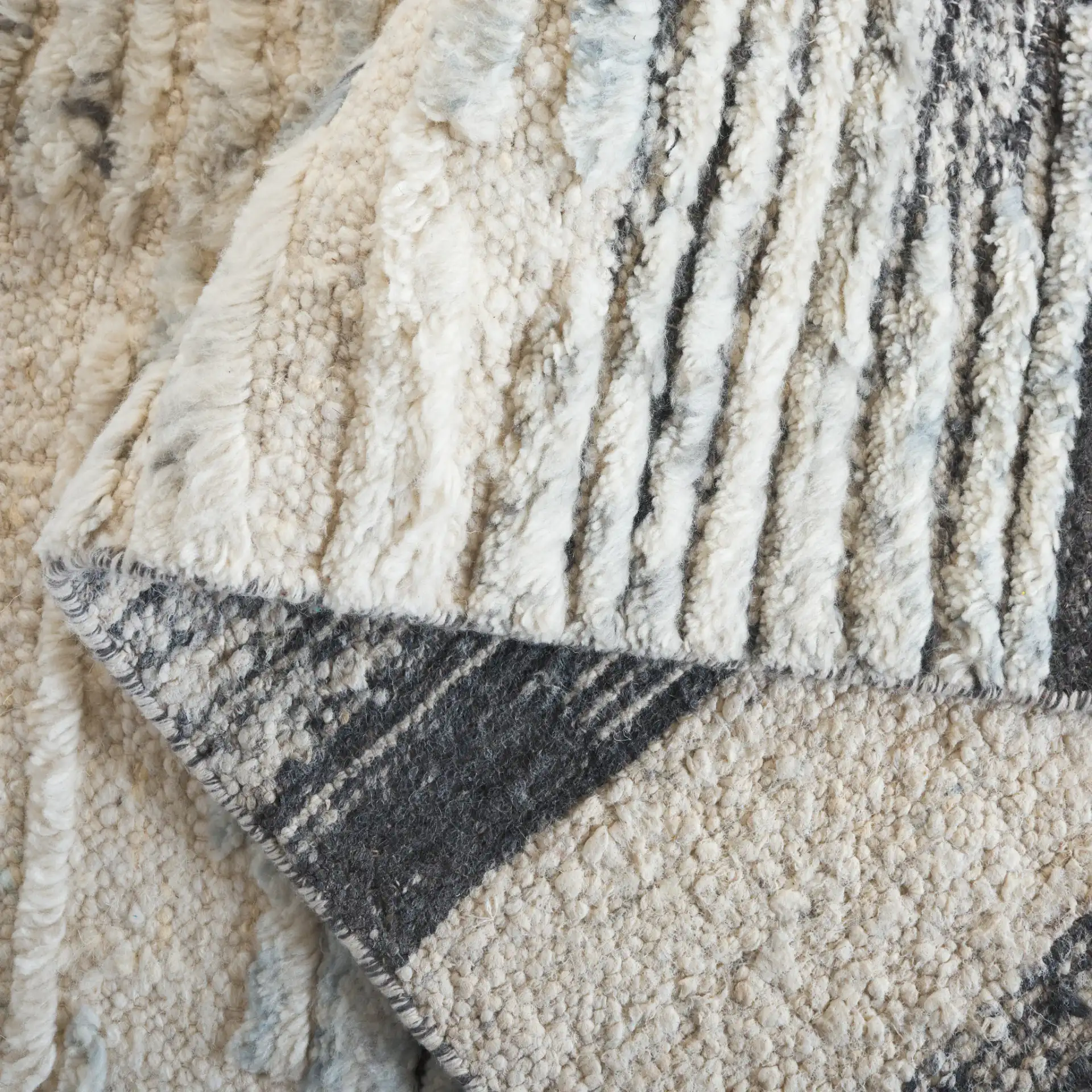Tribeca Striated Abstract Hand-Knotted Wool Rug in Blue / Gray in a styled room