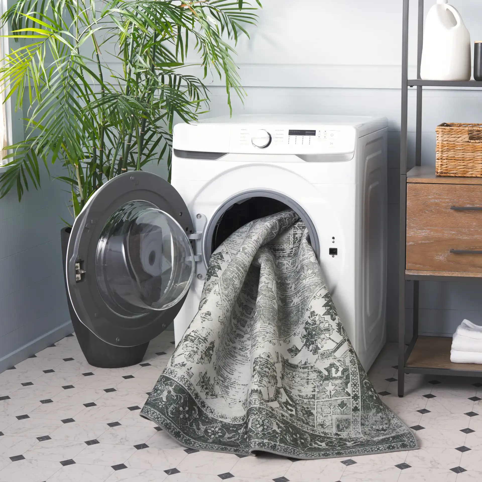 Tucson Distressed Medallion Washable Rug in Dark Sage / Ivory in a styled room