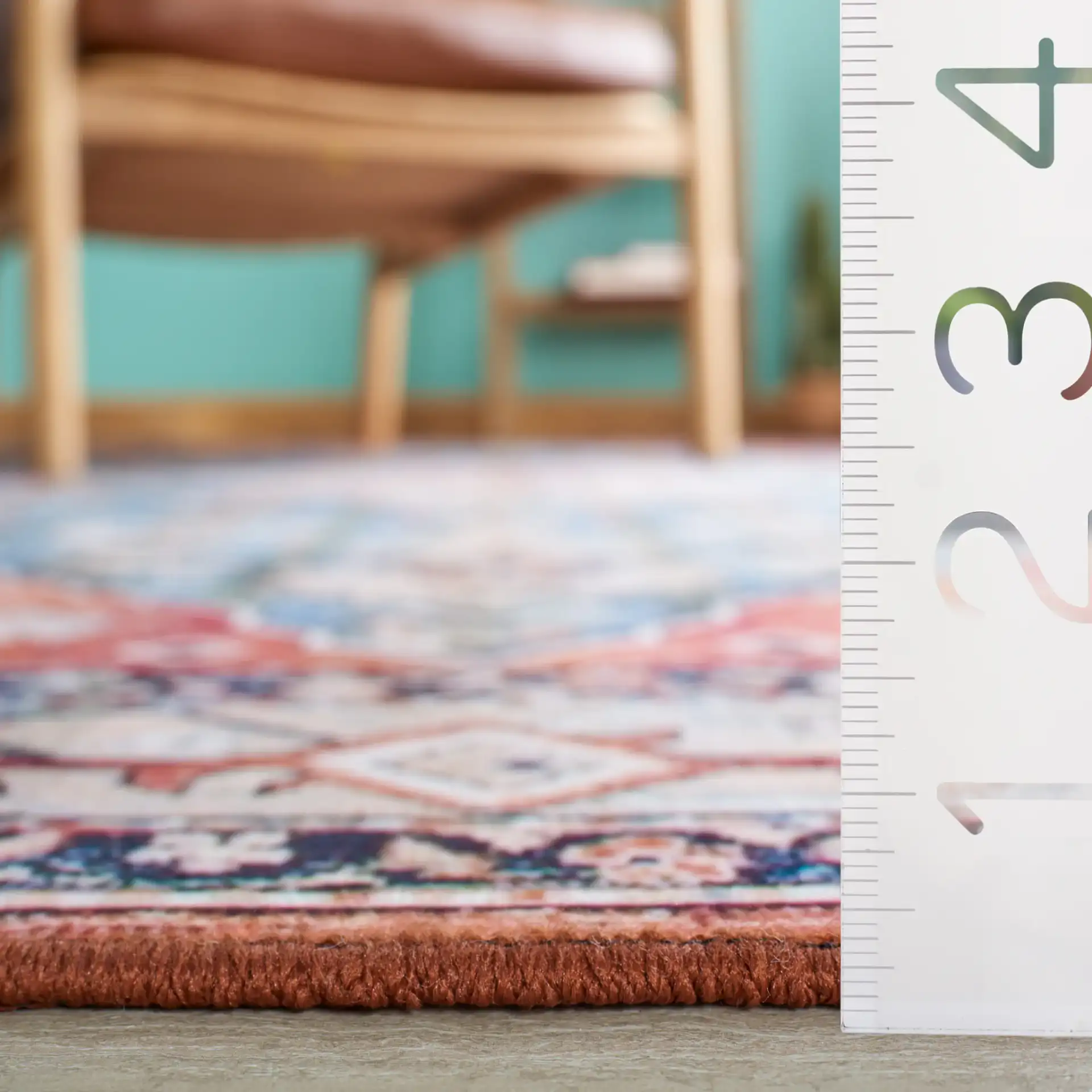 Tucson Tribal Diamond Washable Rug in Beige / Blue in a styled room