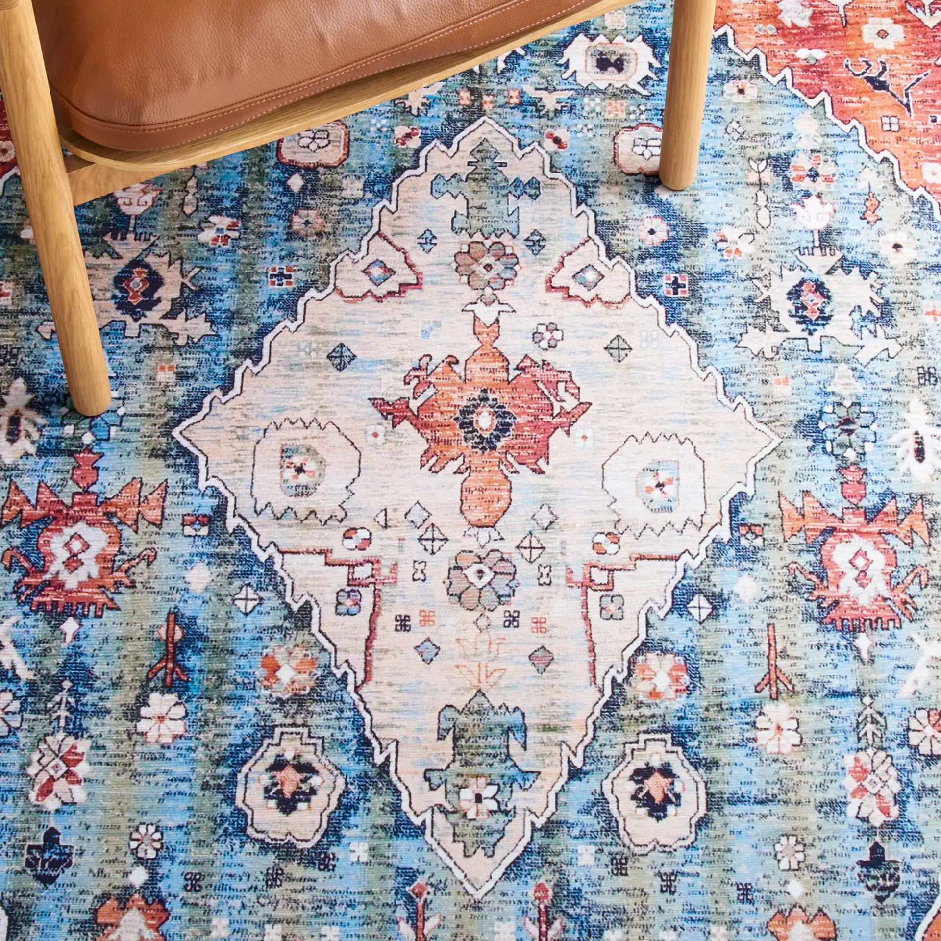 Tucson Tribal Diamond Washable Rug in Beige / Blue in a styled room