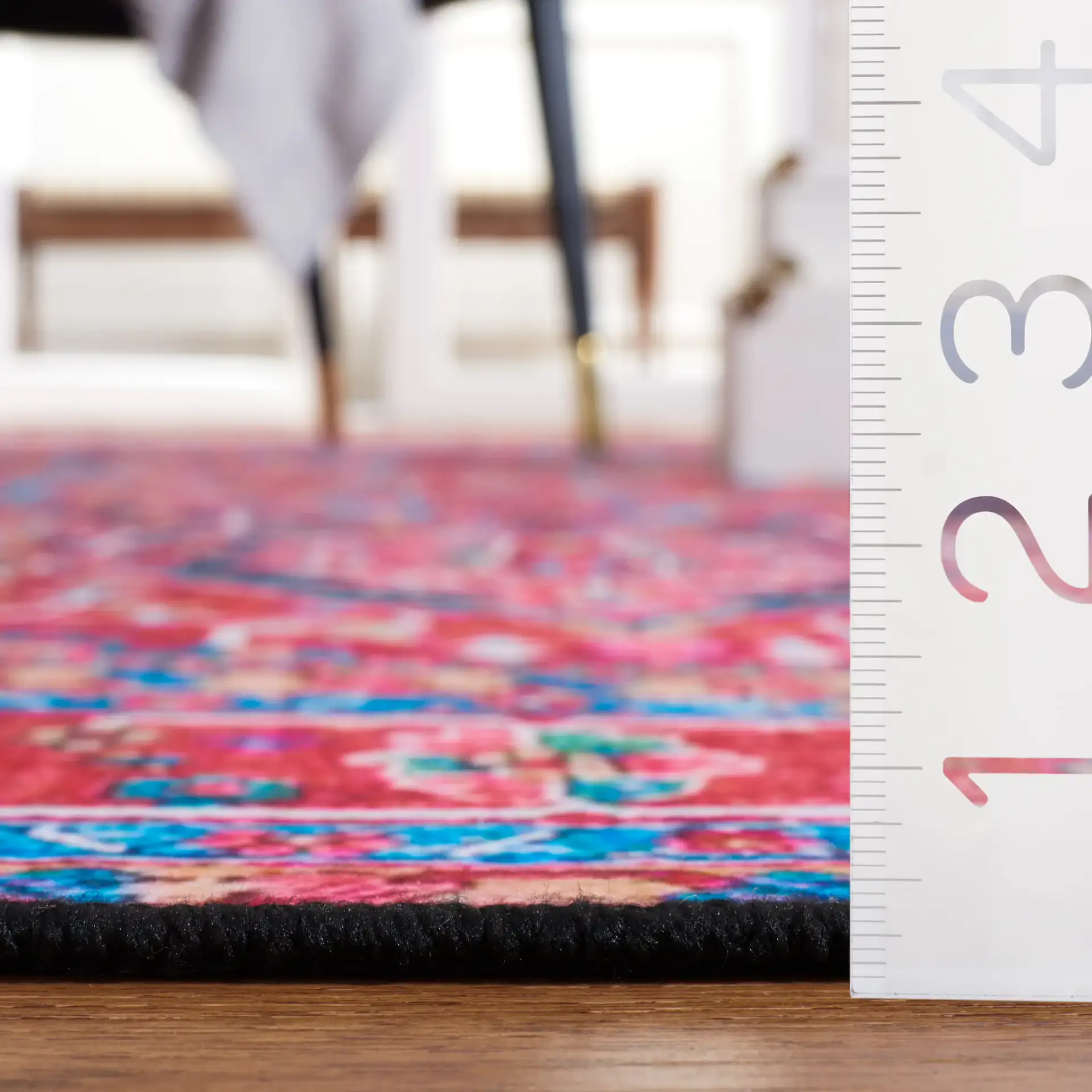 Tucson Traditional Diamond Medallion Washable Rug in Navy / Red in a styled room