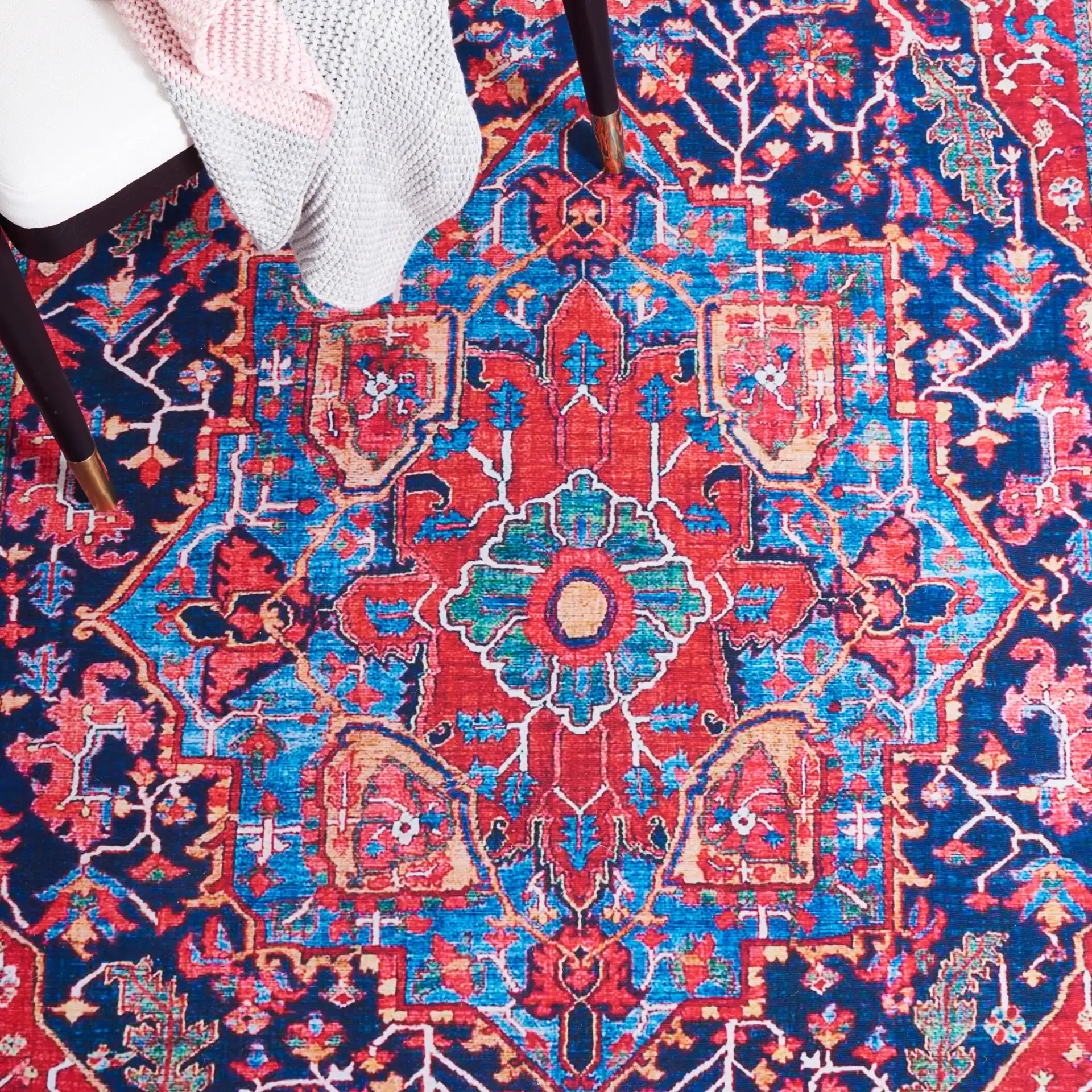 Tucson Traditional Diamond Medallion Washable Rug in Navy / Red in a styled room
