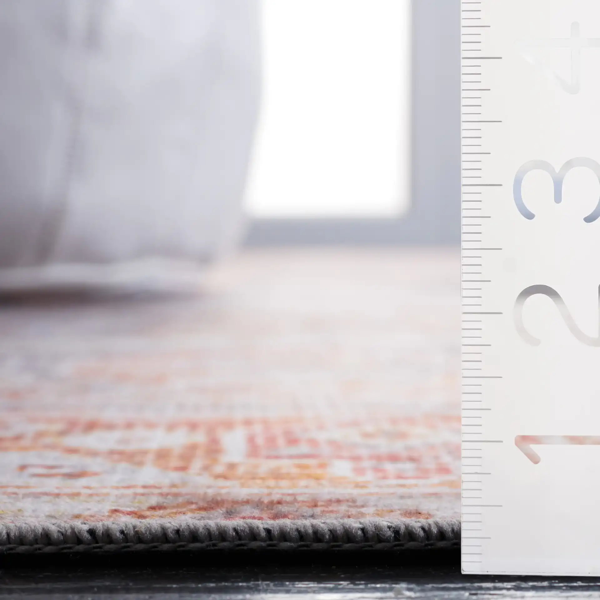 Tucson Tribal Hexagon Diamond Washable Rug in Gray / Rust in a styled room