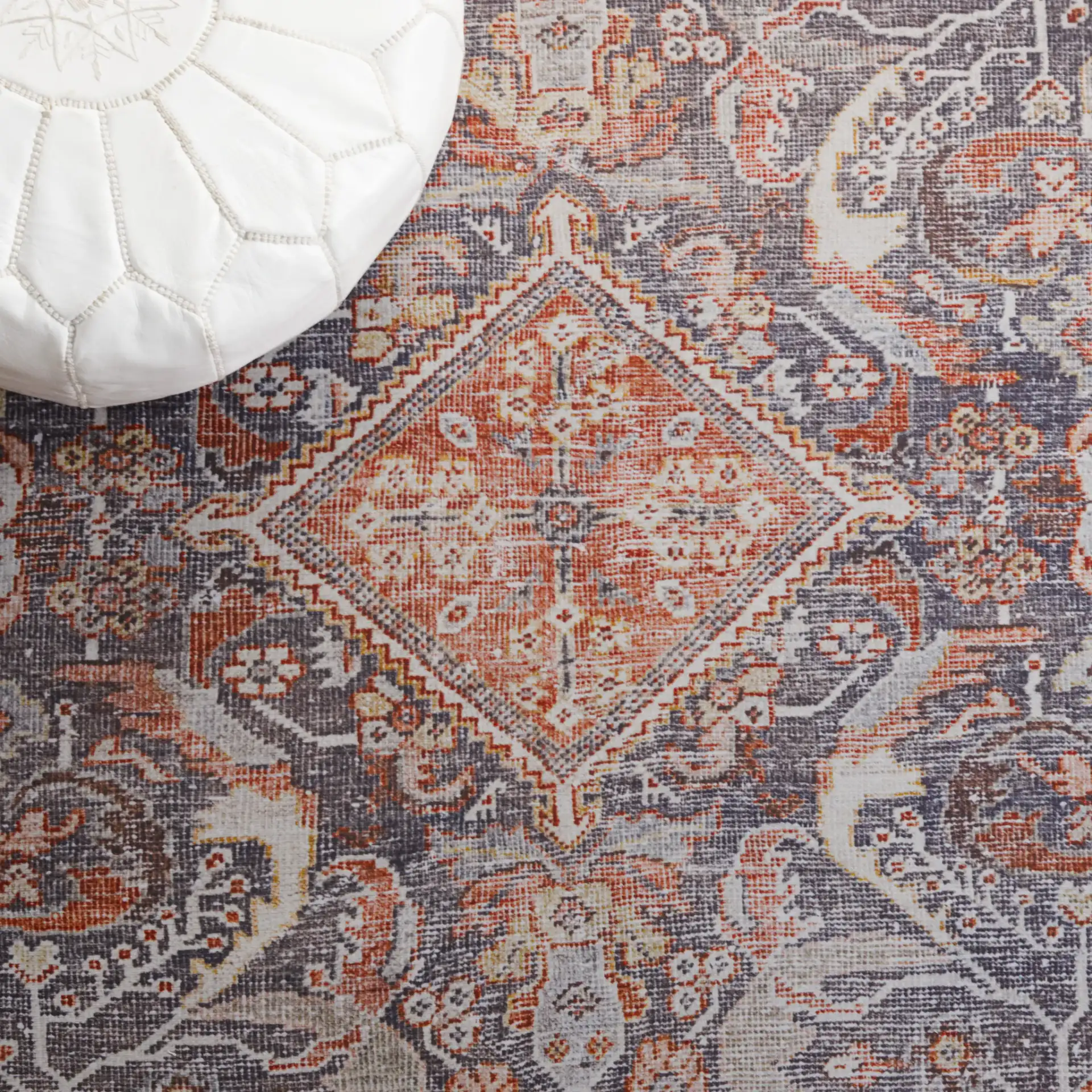 Tucson Tribal Hexagon Diamond Washable Rug in Gray / Rust in a styled room