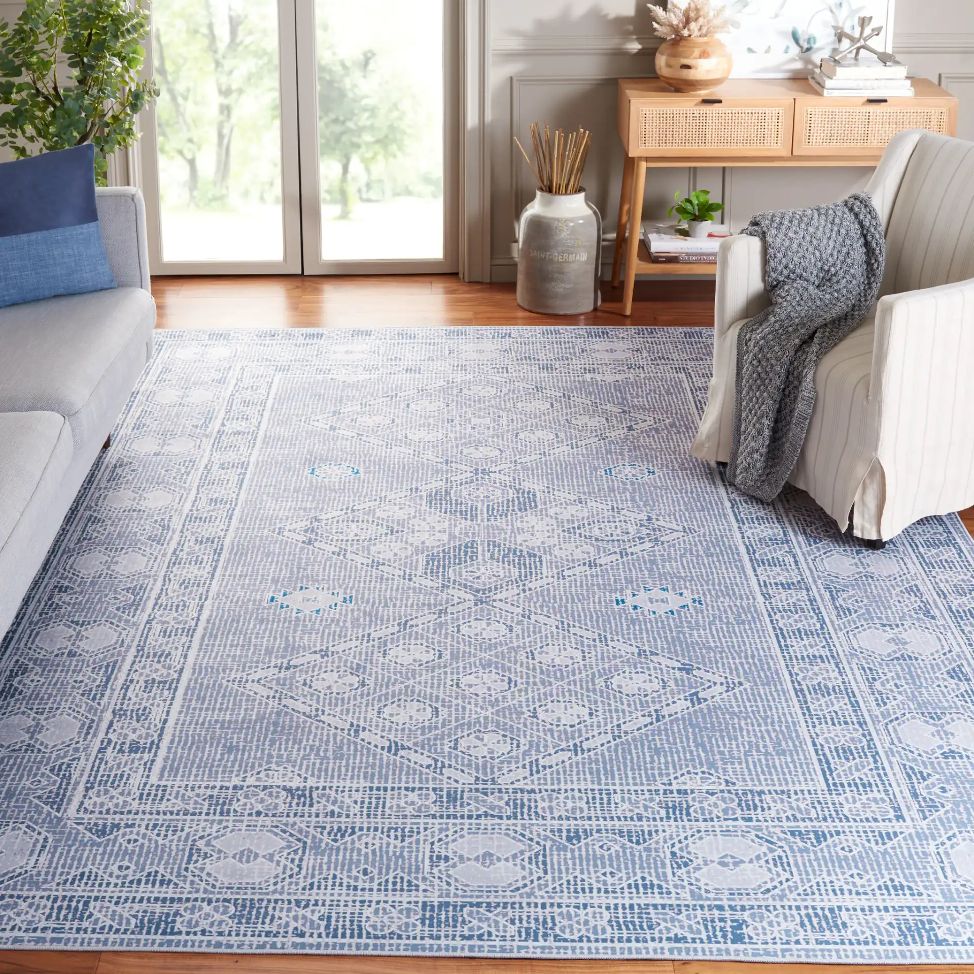 Tucson Triple Diamond Washable Rug in Gray / Ivory in a styled room